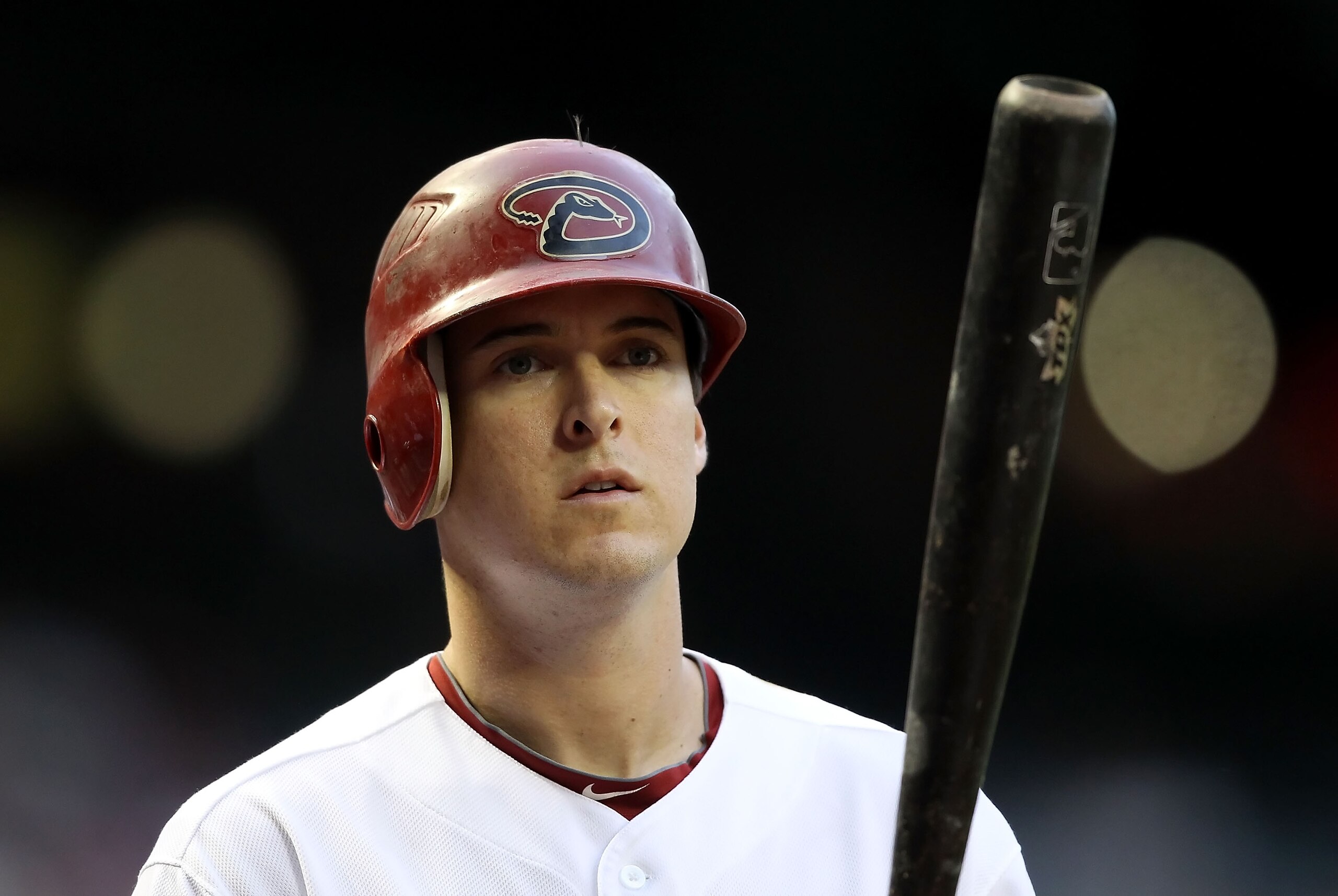 PHOENIX, AZ - MAY 05:  Kelly Johnson #2 of the Arizona Diamondbacks warms up on deck during the Major League Baseball game against the Colorado Rockies at Chase Field on May 5, 2011 in Phoenix, Arizona.  (Photo by Christian Petersen/Getty Images)