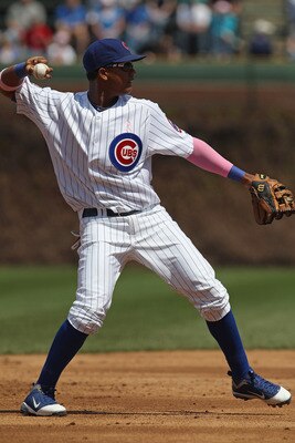 CHICAGO, IL - MAY 08: Starlin Castro #13 of the Chicago Cubs throws to 1st base against the Cincinnati Reds at Wrigley Field on May 8, 2011 in Chicago, Illinois. The Reds defeated the Cubs 2-0.  (Photo by Jonathan Daniel/Getty Images)