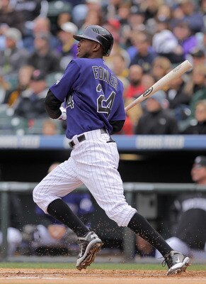 DENVER, CO - MAY 01:  Center fielder Dexter Fowler #24 of the Colorado Rockies takes an at bat against the Pittsburgh Pirates at Coors Field on May 1, 2011 in Denver, Colorado. The Pirates defeated the Rockies 8-4.  (Photo by Doug Pensinger/Getty Images)