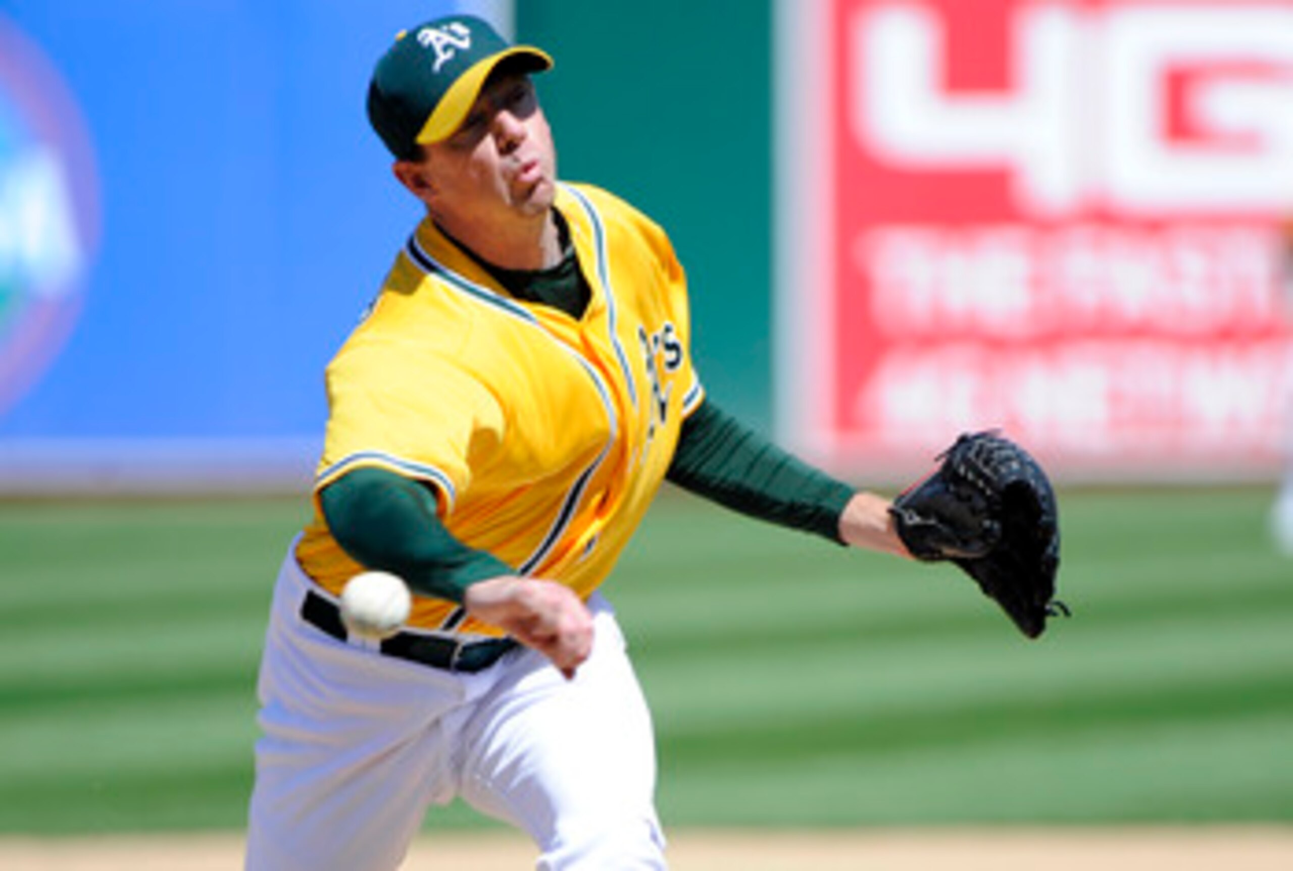OAKLAND, CA - MAY 1: Brad Ziegler #31 of the Oakland Athletics pitches against the Texas Rangers during a MLB baseball game at the Oakland-Alameda County Coliseum May 1, 2011 in Oakland, California. (Photo by Thearon W. Henderson/Getty Images)
