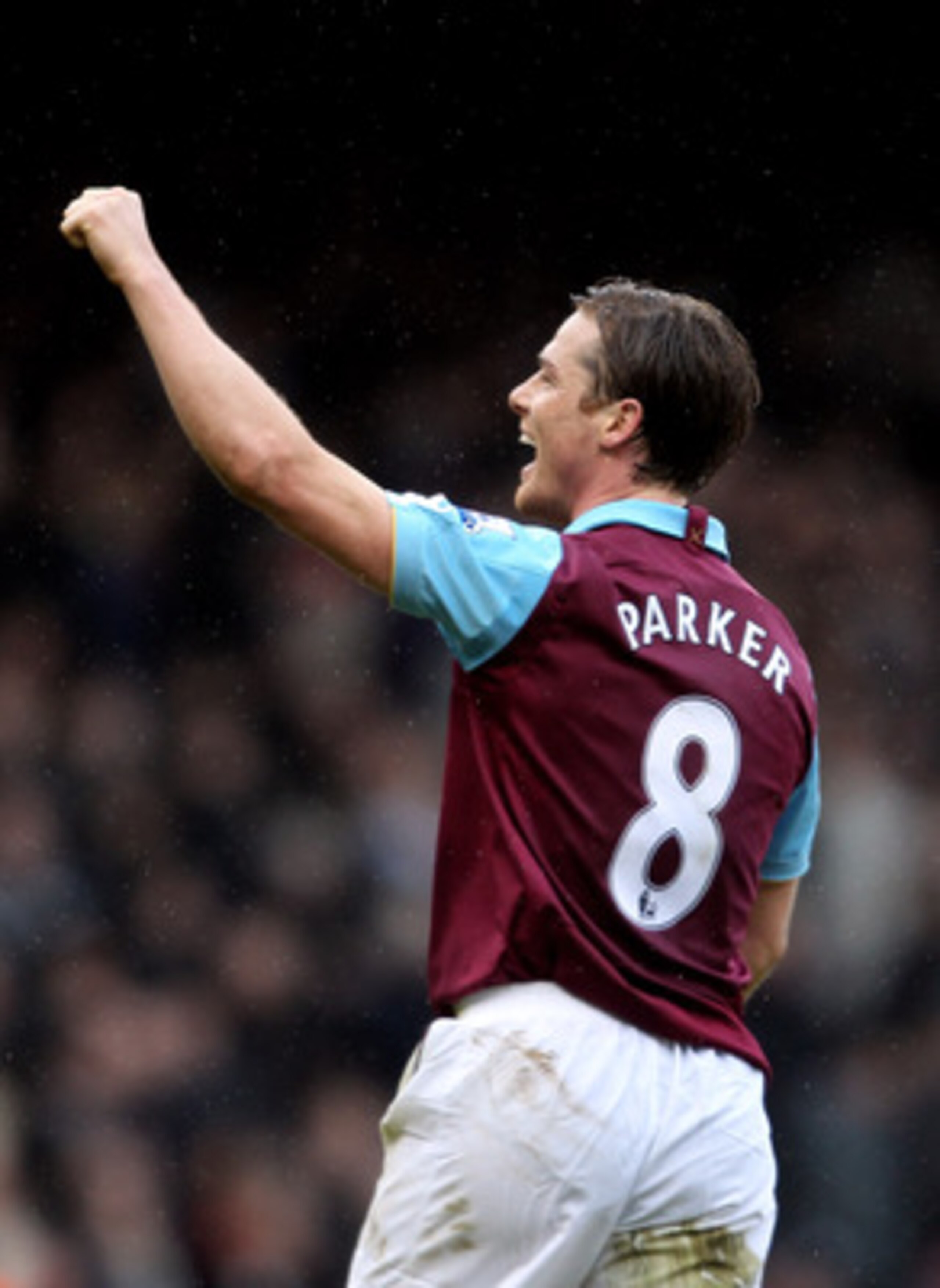 LONDON, ENGLAND - FEBRUARY 27:  Scott Parker of West Ham celebrates as teammate Carlton Cole (not pictured) scores their third goal during the Barclays Premier League match between West Ham United and Liverpool at the Boleyn Ground on February 27, 2011 in
