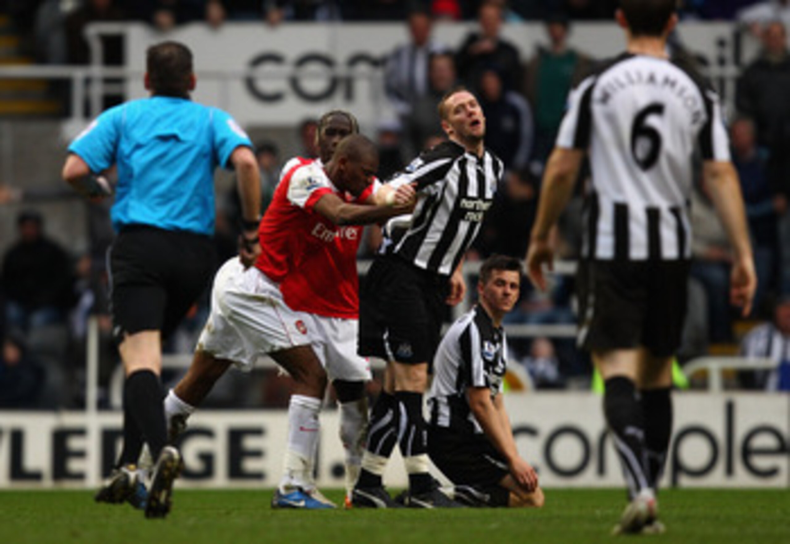 NEWCASTLE UPON TYNE, ENGLAND - FEBRUARY 05:  Abou Diaby of Arsenal pushes Kevin Nolan of Newcastle and gets sent off during the Barclays Premier League match between Newcastle United and Arsenal at St James' Park on February 5, 2011 in Newcastle upon Tyne
