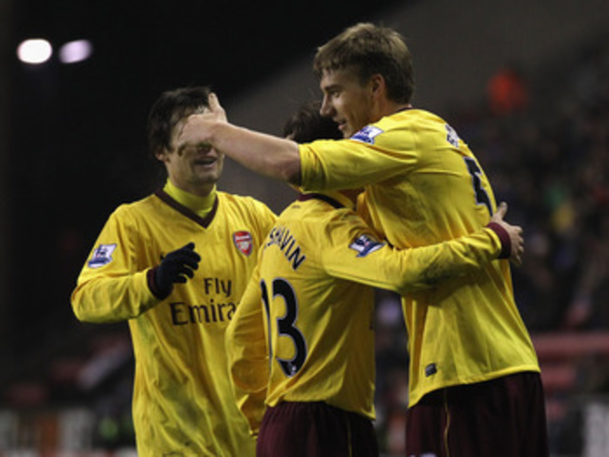 WIGAN, ENGLAND - DECEMBER 29:  Nicolas Bendtner of Arsenal celebrates with Andrey Arshavin after scoring his goal during the Barclays Premier League match between Wigan Athletic and Arsenal at DW Stadium on December 29, 2010 in Wigan, England.  (Photo by