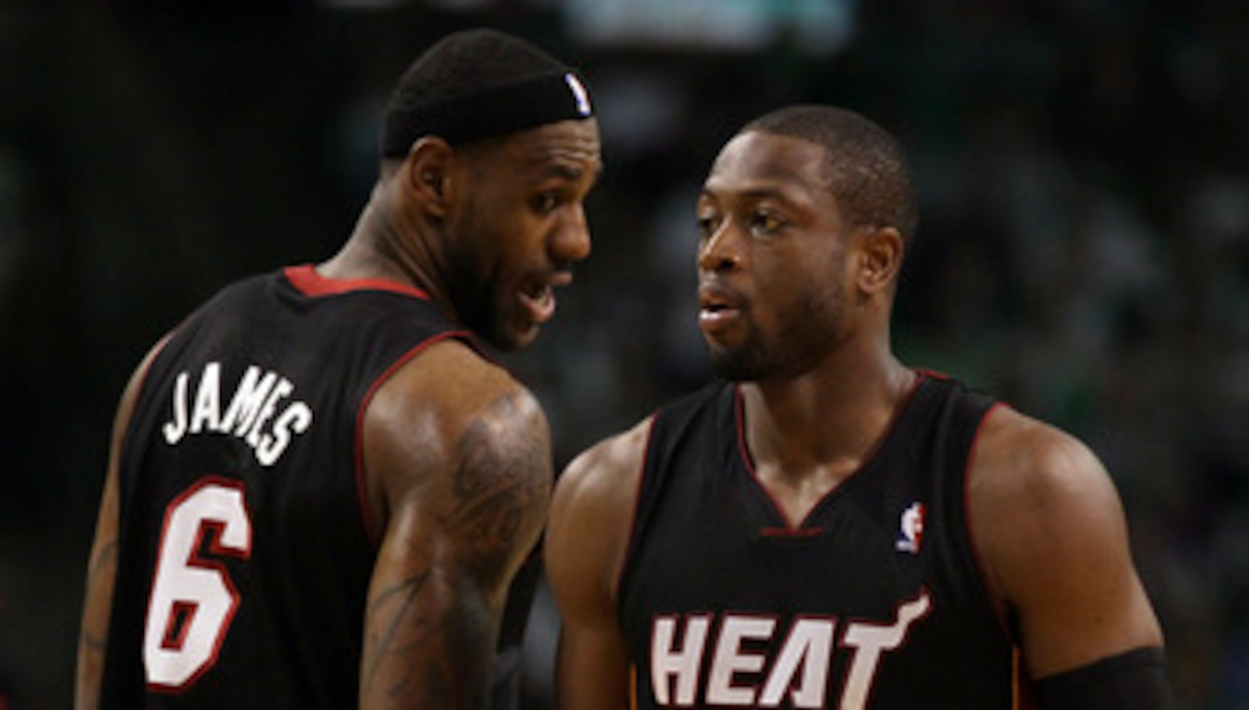 BOSTON, MA - MAY 09: LeBron James #6 talks with teamamte Dwyane Wade #3 of the Miami Heat in Game Four of the Eastern Conference Semifinals in the 2011 NBA Playoffs on May 9, 2011 at the TD Garden in Boston, Massachusetts.  The Miami Heat defeated the Bos