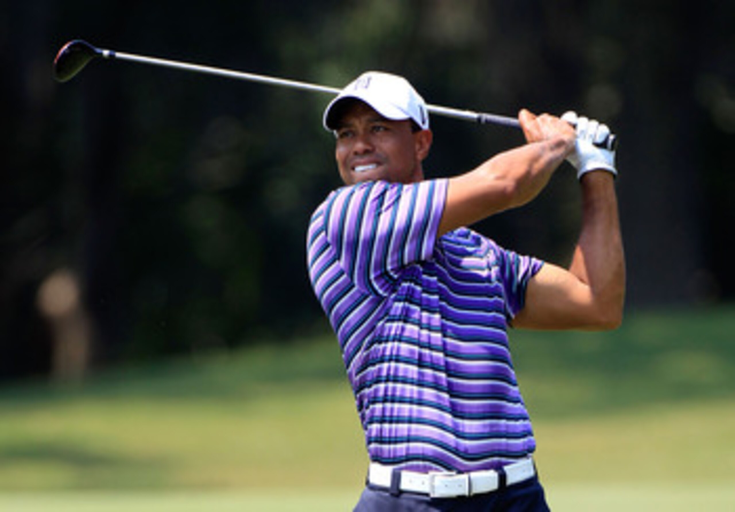 PONTE VEDRA BEACH, FL - MAY 10:  Tiger Woods hits a shot during a practice round prior to the start of THE PLAYERS Championship held at THE PLAYERS Stadium course at TPC Sawgrass on May 10, 2011 in Ponte Vedra Beach, Florida.  (Photo by Sam Greenwood/Gett
