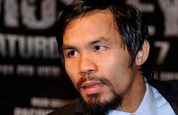 LAS VEGAS, NV - MAY 07:  Boxer Manny Pacquiao listens to a question at a post-fight news conference after he defeated Shane Mosley by unanimous decision to retain his WBO welterweight title at the MGM Grand Garden Arena May 7, 2011 in Las Vegas, Nevada.