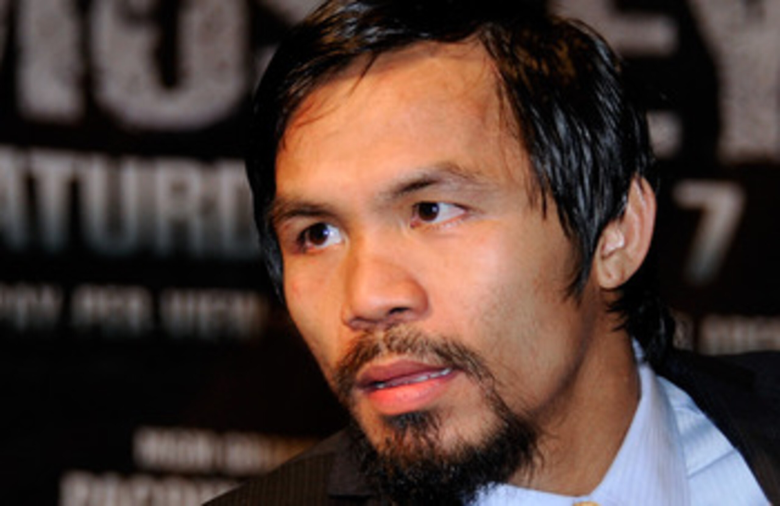 LAS VEGAS, NV - MAY 07:  Boxer Manny Pacquiao listens to a question at a post-fight news conference after he defeated Shane Mosley by unanimous decision to retain his WBO welterweight title at the MGM Grand Garden Arena May 7, 2011 in Las Vegas, Nevada.