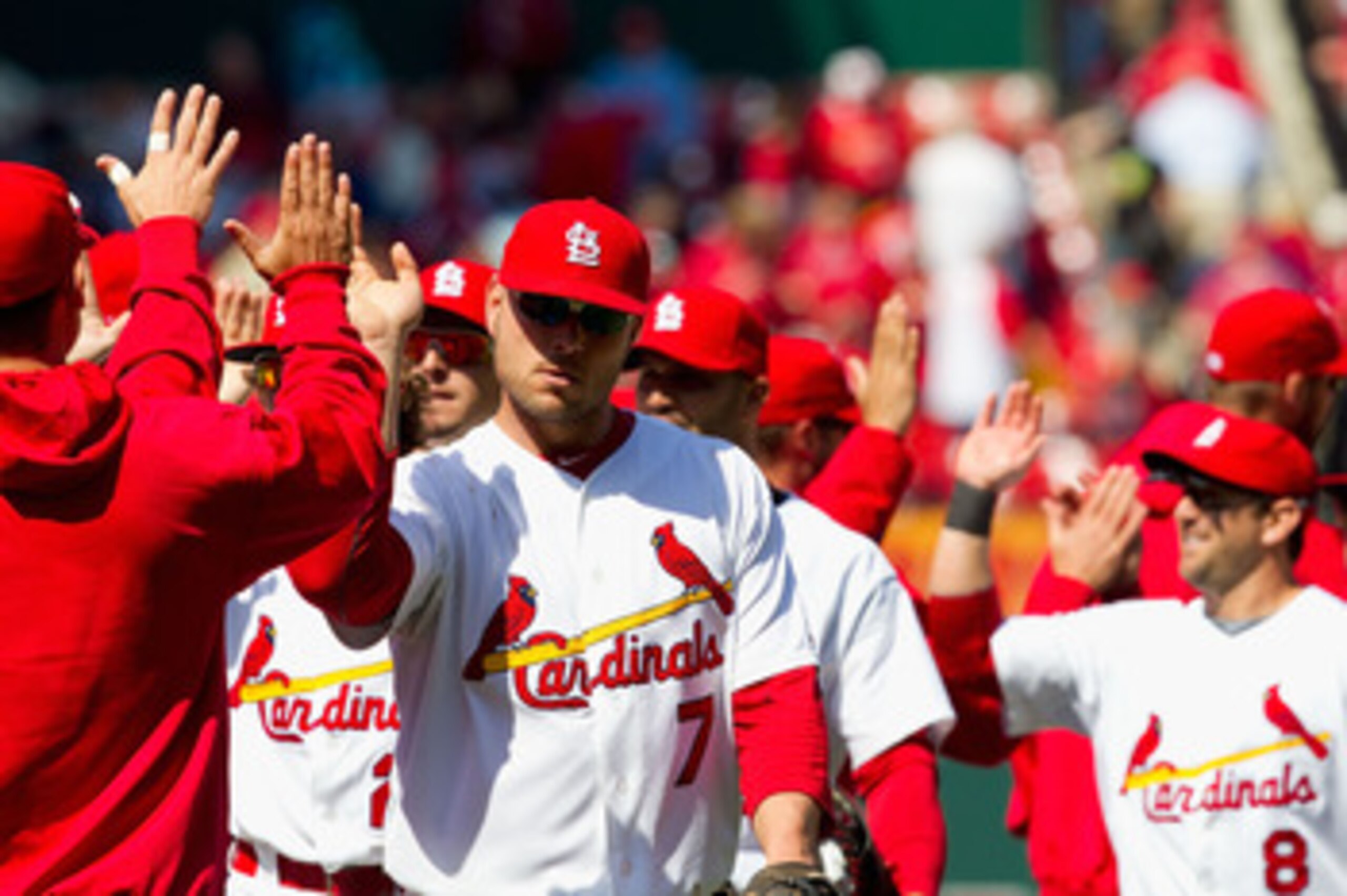 ST. LOUIS, MO - APRIL 21: Matt Holliday #7 of the St. Louis Cardinals celebrates a victory over the Washington Nationals with teammates at Busch Stadium on April 21, 2011 in St. Louis, Missouri.  (Photo by Dilip Vishwanat/Getty Images)
