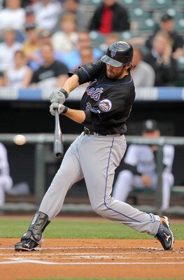 DENVER, CO - MAY 10:  Ike Davis #29 of the New York Mets hits a two RBI single off of starting pitcher Jason Hammel #46 of the Colorado Rockies in the first inning at Coors Field on May 10, 2011 in Denver, Colorado.  (Photo by Doug Pensinger/Getty Images)