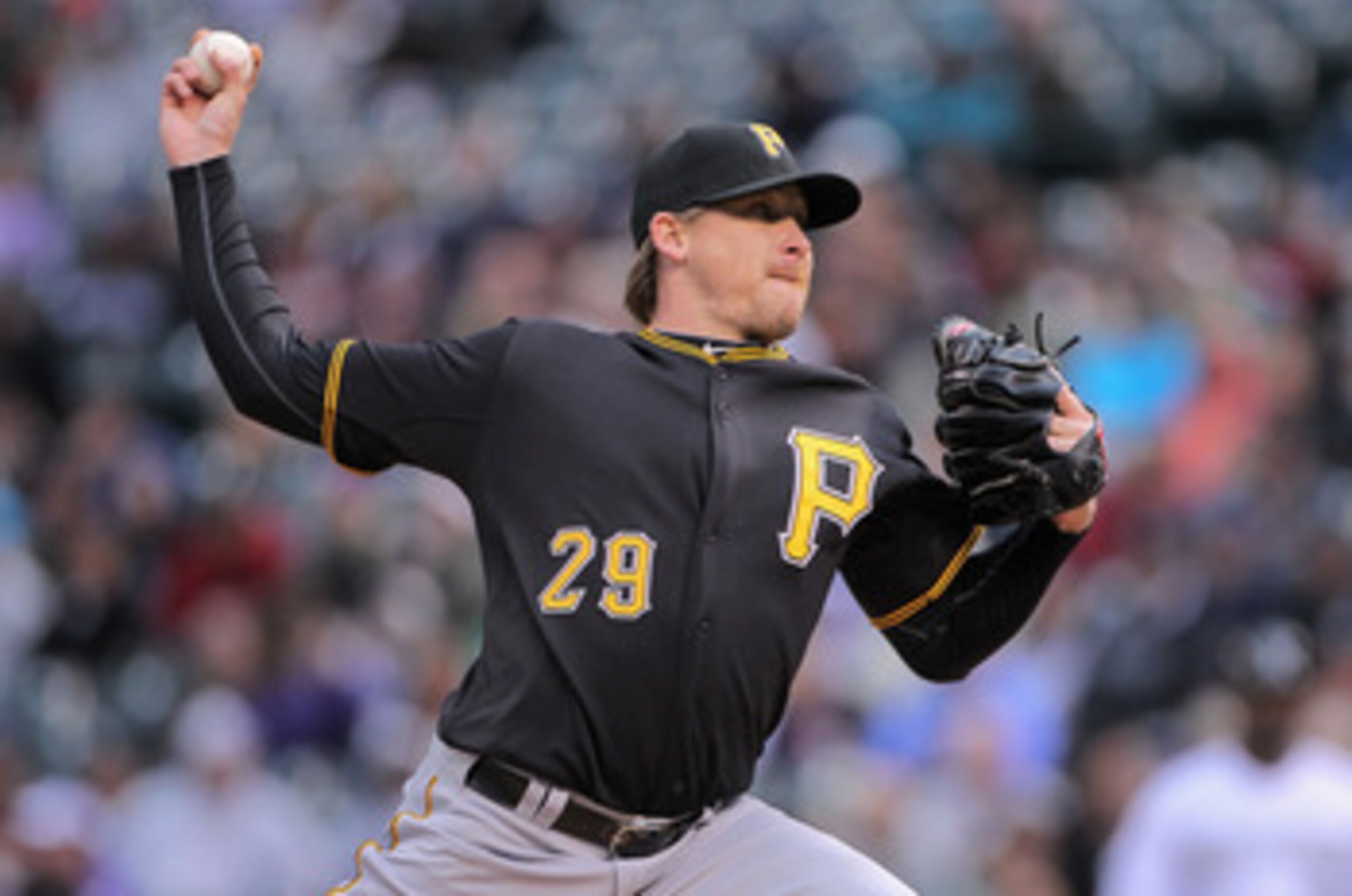 DENVER, CO - APRIL 29:  Starting pitcher Kevin Correia #29 of the Pittsburgh Pirates delivers against the Colorado Rockies at Coors Field on April 29, 2011 in Denver, Colorado.  (Photo by Doug Pensinger/Getty Images)