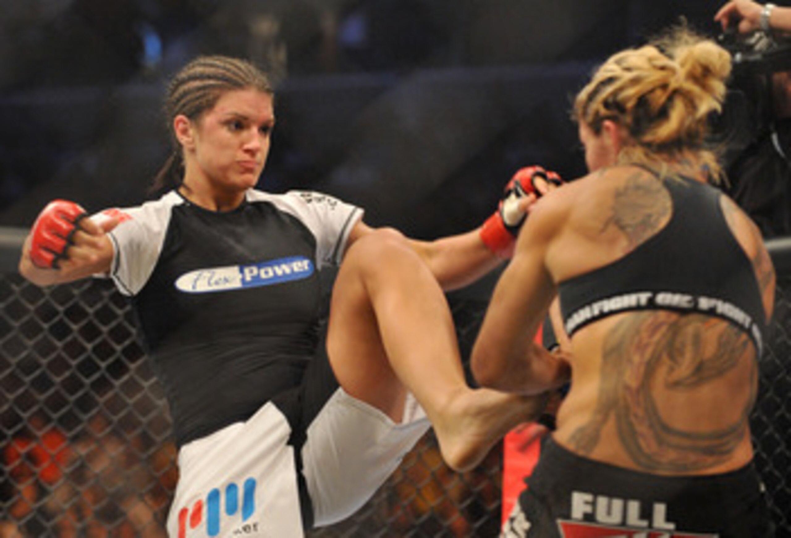 SAN JOSE, CA - AUGUST 15: Cris Cyborg (R) battles Gina Carano during their Middleweight Championship fight at Stikeforce: Carano vs. Cyborg on August 15, 2009 in San Jose, California. (Photo by Jon Kopaloff/Getty Images) SAN JOSE, CA - AUGUST 15: Cris Cyborg (R) battles Gina Carano during their Middleweight Championship fight at Stikeforce: Carano vs. Cyborg on August 15, 2009 in San Jose, California. (Photo by Jon Kopaloff/Getty Images)