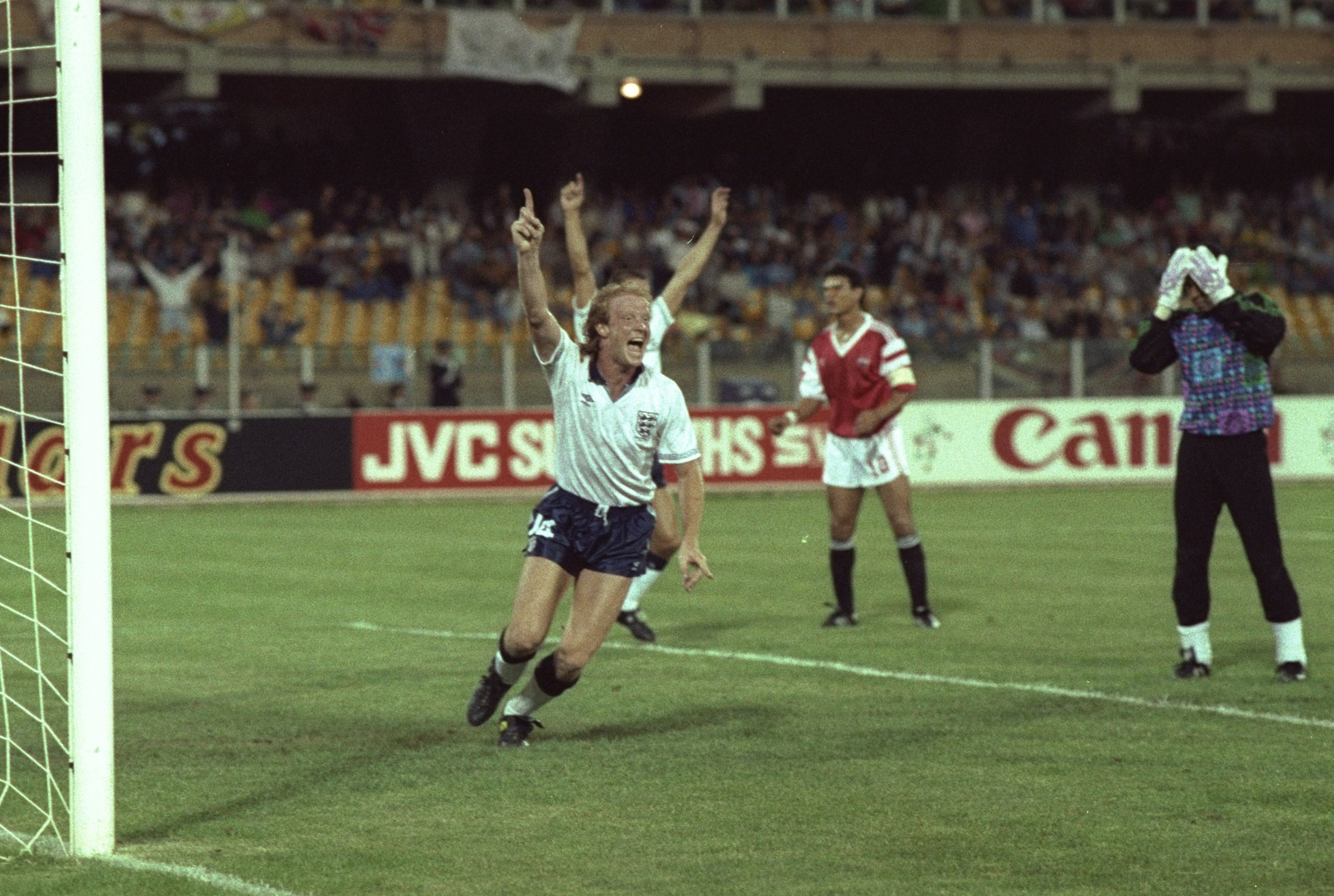 21 Jun 1990: Mark Wright (centre) of England scores the only goal during the World Cup match against Egypt in Cagliori, Italy. England won the match 1-0. \ Mandatory Credit: David Cannon/Allsport 21 Jun 1990: Mark Wright (centre) of England scores the only goal during the World Cup match against Egypt in Cagliori, Italy. England won the match 1-0. \ Mandatory Credit: David Cannon/Allsport