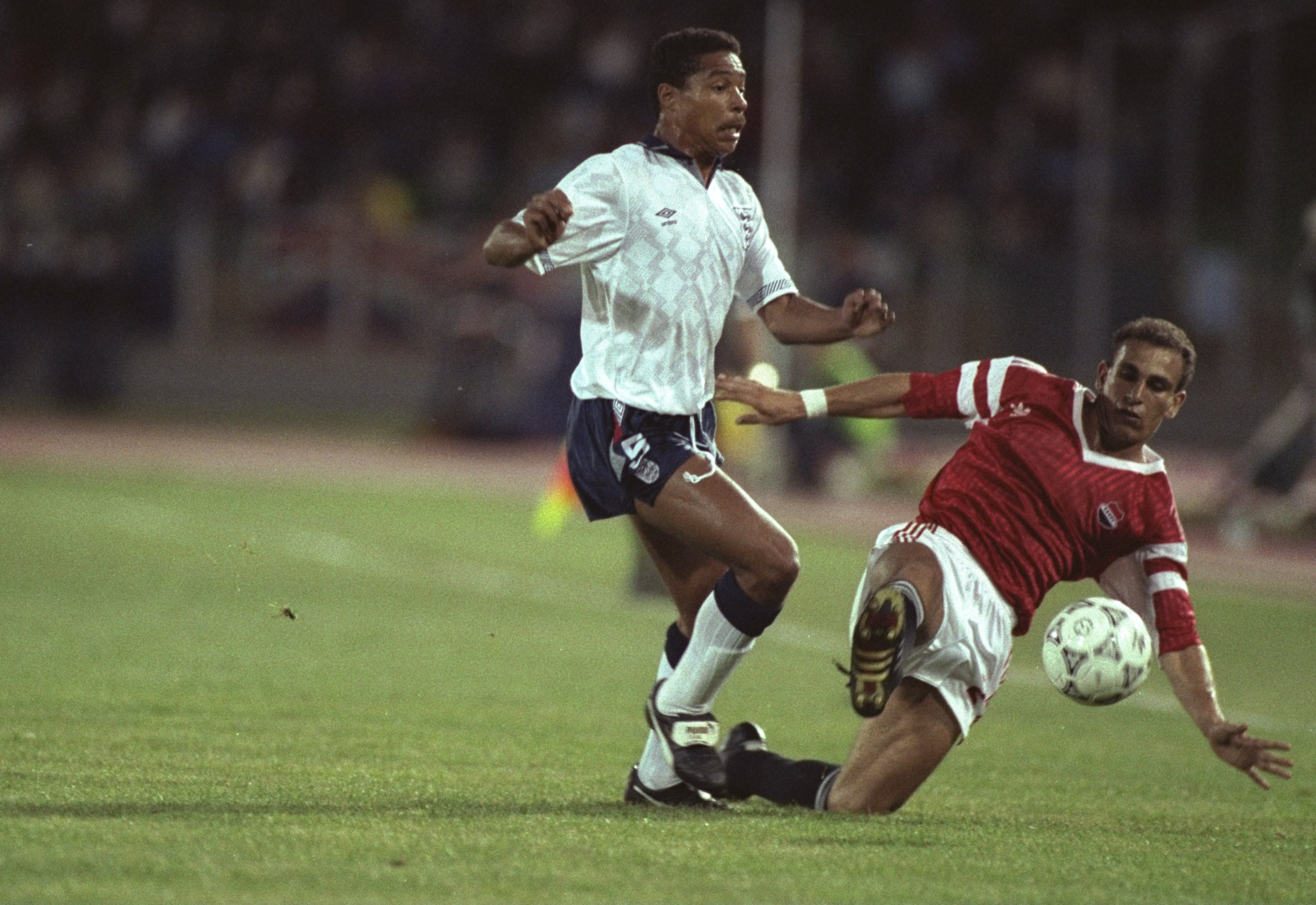 21 Jun 1990: Des Walker (left) of England is robbed of the ball by Ibrahim Hassan (right) of Egypt during the World Cup match in Cagliari, Italy. England won the match 1-0. \ Mandatory Credit: David Cannon/Allsport 21 Jun 1990: Des Walker (left) of England is robbed of the ball by Ibrahim Hassan (right) of Egypt during the World Cup match in Cagliari, Italy. England won the match 1-0. \ Mandatory Credit: David Cannon/Allsport