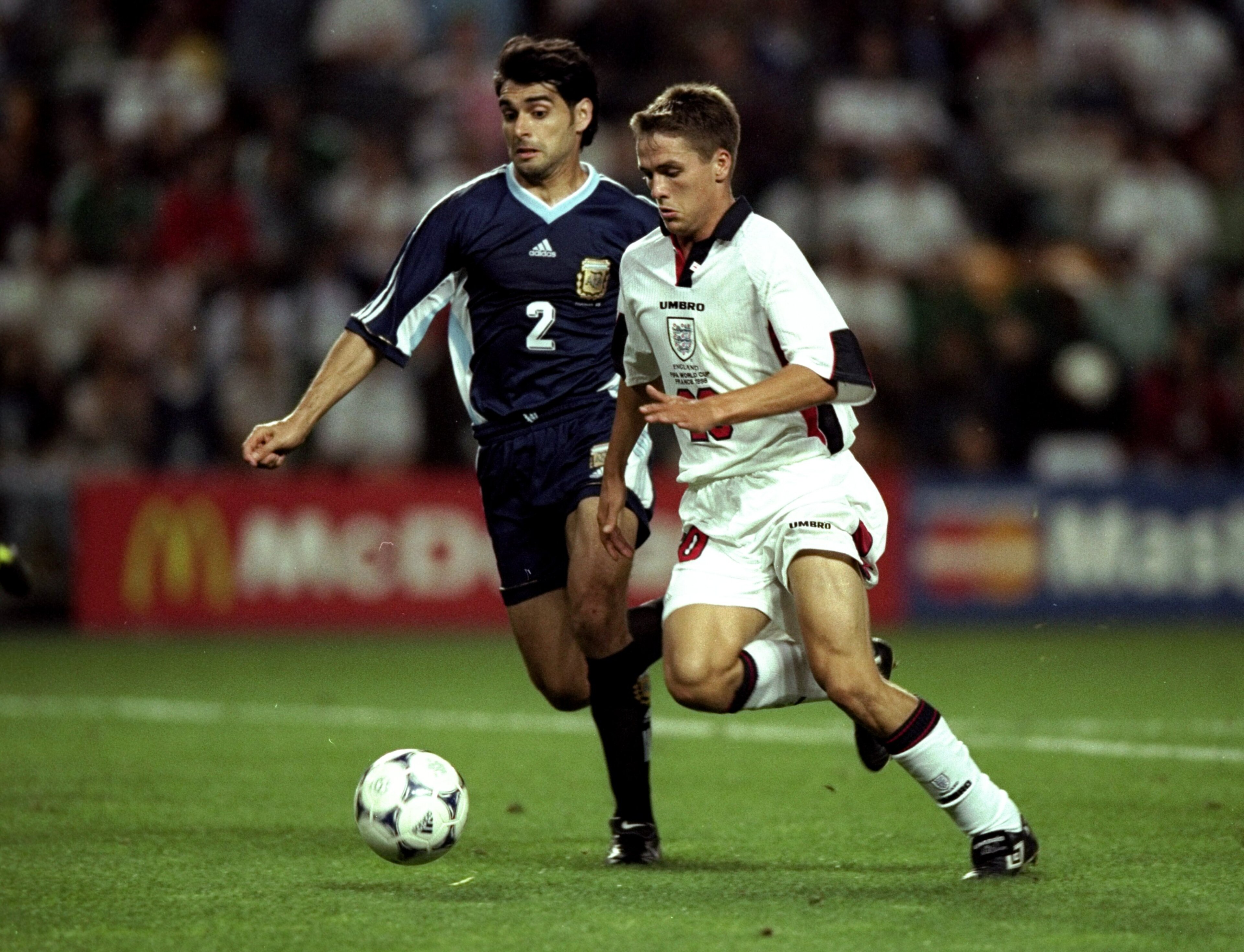 30 Jun 1998: Michael Owen of England in action against Roberto Ayala of Argentina during the 1998 World Cup match against Argentina played in St Etienne, France. The match finished in a 2-2 draw after extra-time and in a dramatic twist England once agai 30 Jun 1998: Michael Owen of England in action against Roberto Ayala of Argentina during the 1998 World Cup match against Argentina played in St Etienne, France. The match finished in a 2-2 draw after extra-time and in a dramatic twist England once agai