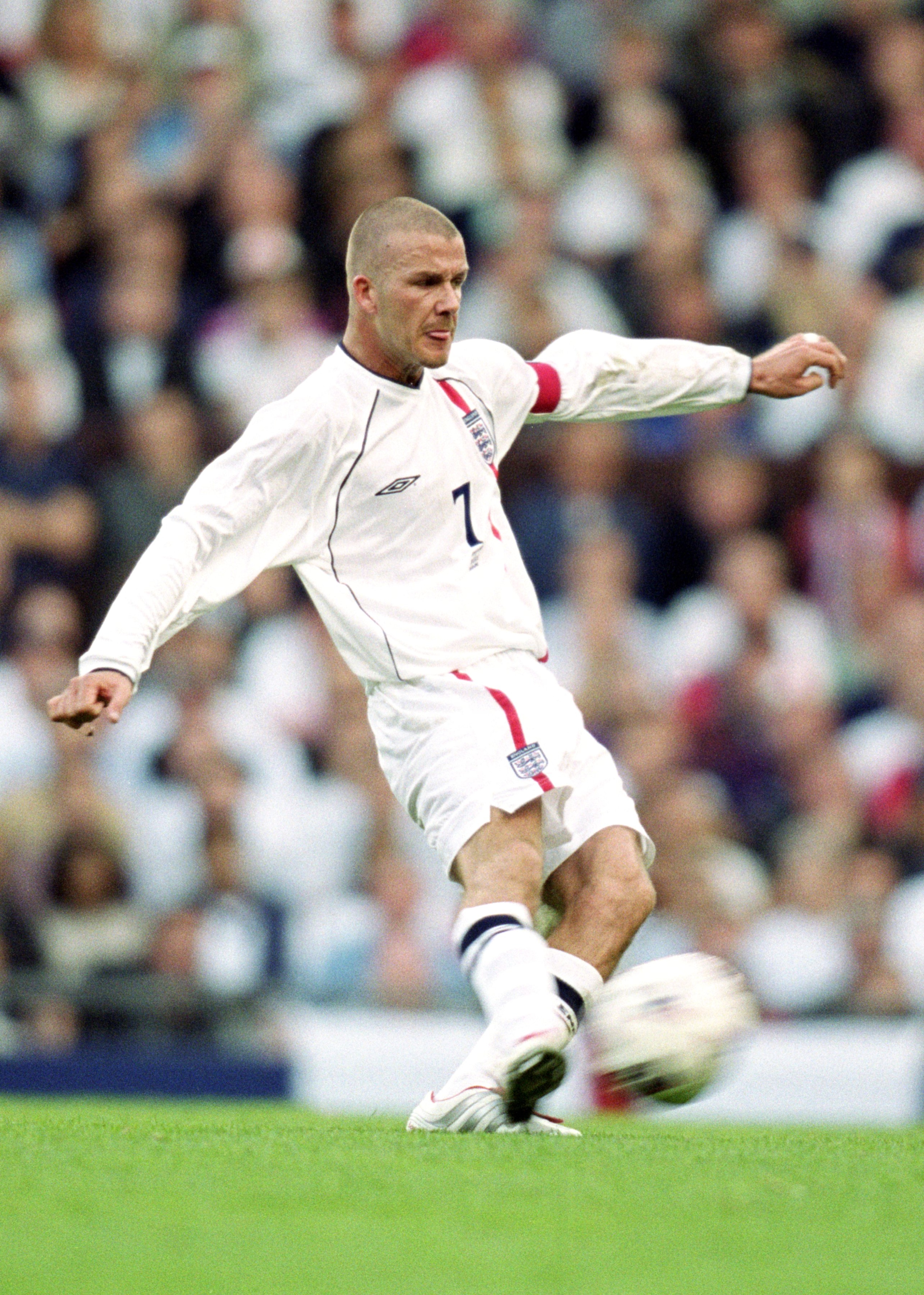 6 Oct 2001: David Beckham of England scores an injury time equalising goal during the World Cup Group 9 Qualifier between England and Greece at Old Trafford in Manchester, England. England sealed qualification after the game ended 2-2. \ Mandatory Cred 6 Oct 2001: David Beckham of England scores an injury time equalising goal during the World Cup Group 9 Qualifier between England and Greece at Old Trafford in Manchester, England. England sealed qualification after the game ended 2-2. \ Mandatory Cred