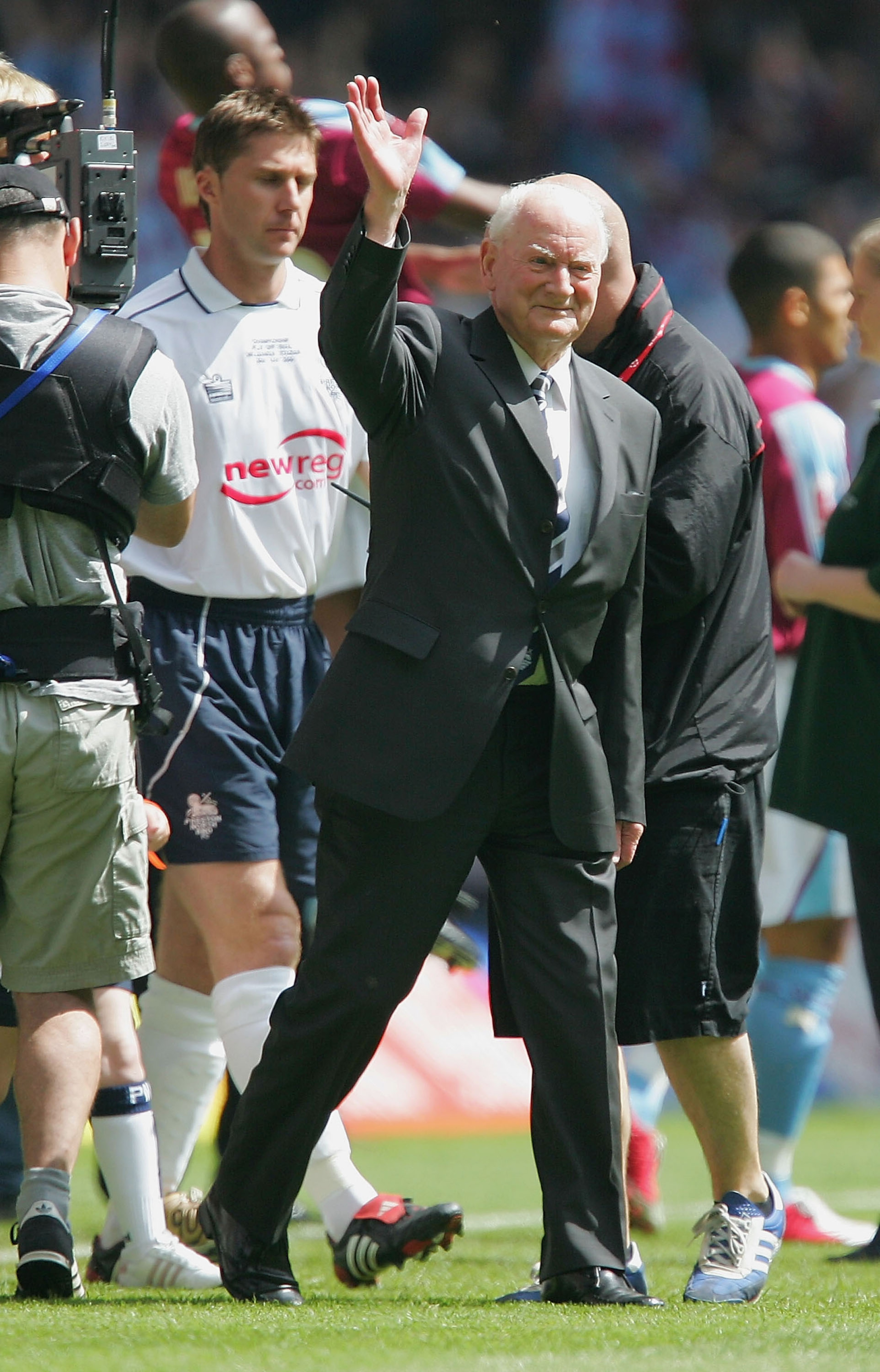 CARDIFF, WALES - MAY 30: Preston North End legend Tom Finney leads his team out before the start of the Coca-Cola Championship Play-Off Final between West Ham United and Preston North End at the Millennium Stadium on May 30, 2005 in Cardiff, Wales. (Pho CARDIFF, WALES - MAY 30: Preston North End legend Tom Finney leads his team out before the start of the Coca-Cola Championship Play-Off Final between West Ham United and Preston North End at the Millennium Stadium on May 30, 2005 in Cardiff, Wales. (Pho