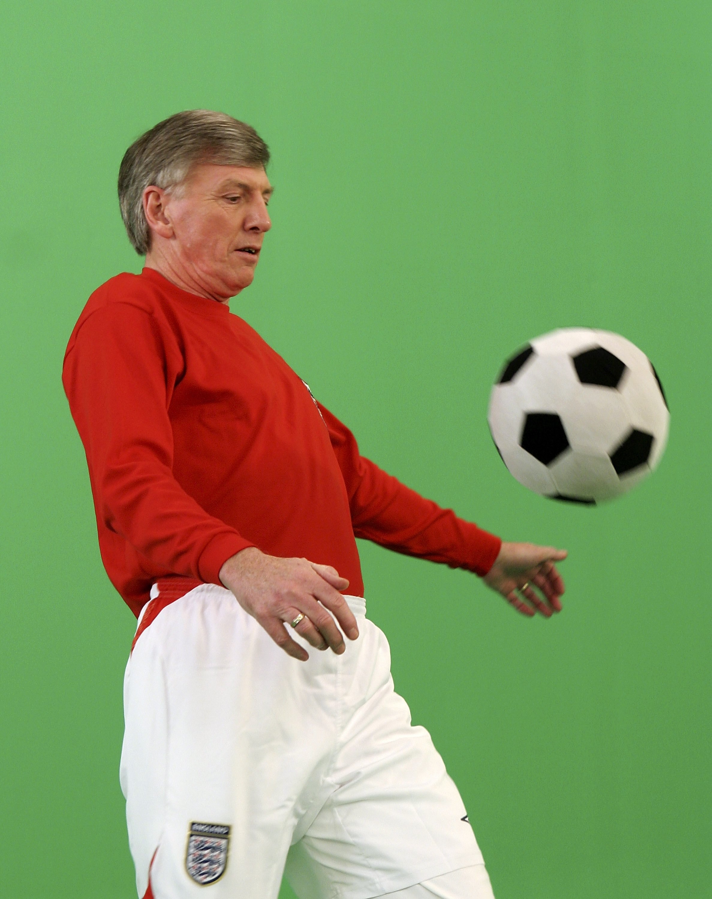 LONDON - APRIL 28:  (UK TABLOID NEWSPAPERS OUT)  Member of the 1966 England World Cup team Martin Peters is filmed for the video to accompany an England World Cup song 'Who Do You Think You Are Kidding, Jurgen Klinsmann' at Camden Studios on April 28, 200