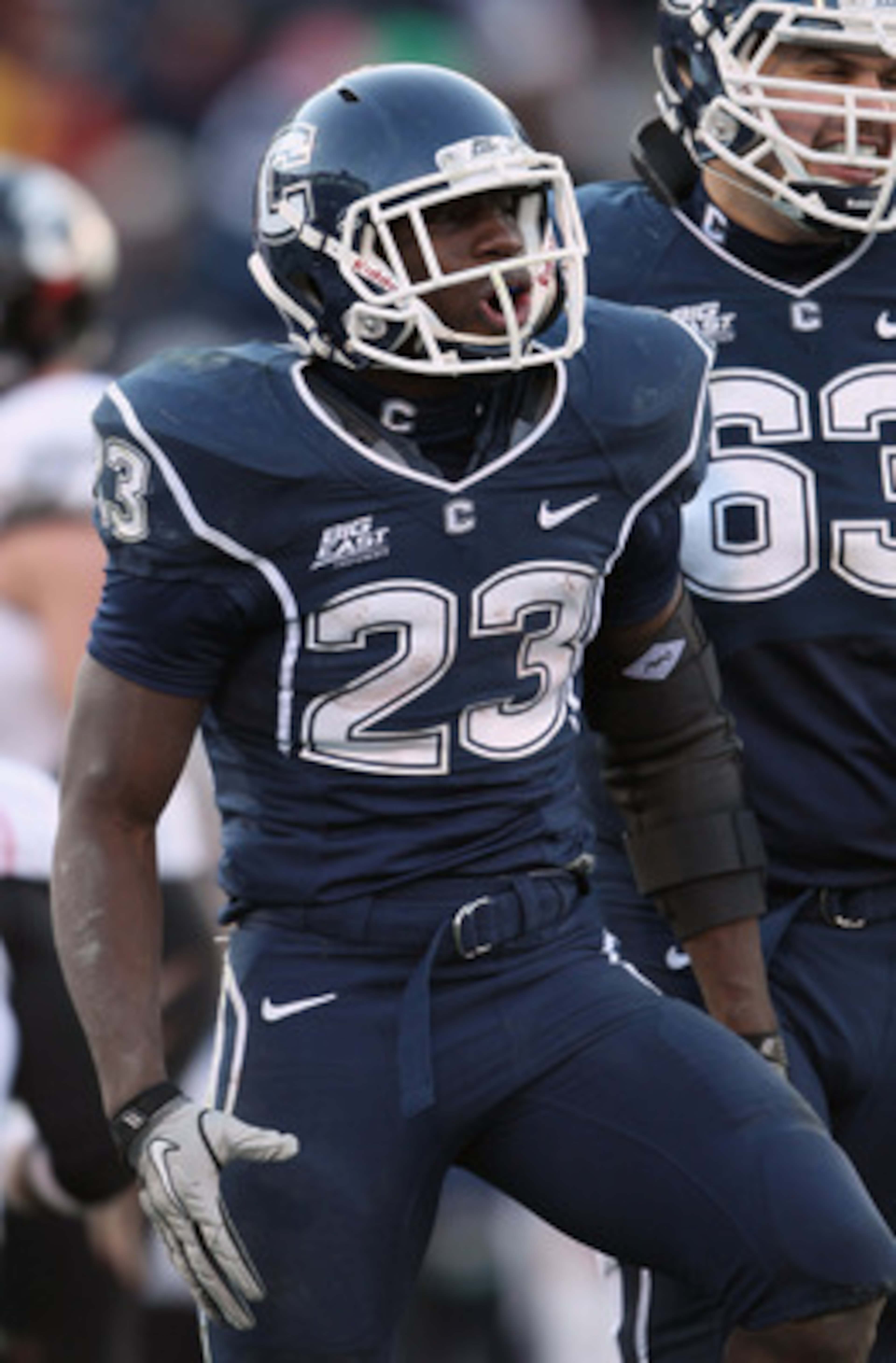 EAST HARTFORD, CT - NOVEMBER 27:  Jordan Todman #23 of the Connecticut Huskies celebrates his touchdown in the fourth quarter against the Cincinnati Bearcats on November 27, 2010 at Rentschler Field in East Hartford, Connecticut. The Huskies defeated the 