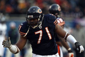 CHICAGO, IL - JANUARY 16:  Israel Idonije #71 of the Chicago Bears reacts after a Bears sack on quarterback Matt Hasselbeck #8 of the Seattle Seahawks in the second half of the 2011 NFC divisional playoff game at Soldier Field on January 16, 2011 in Chica