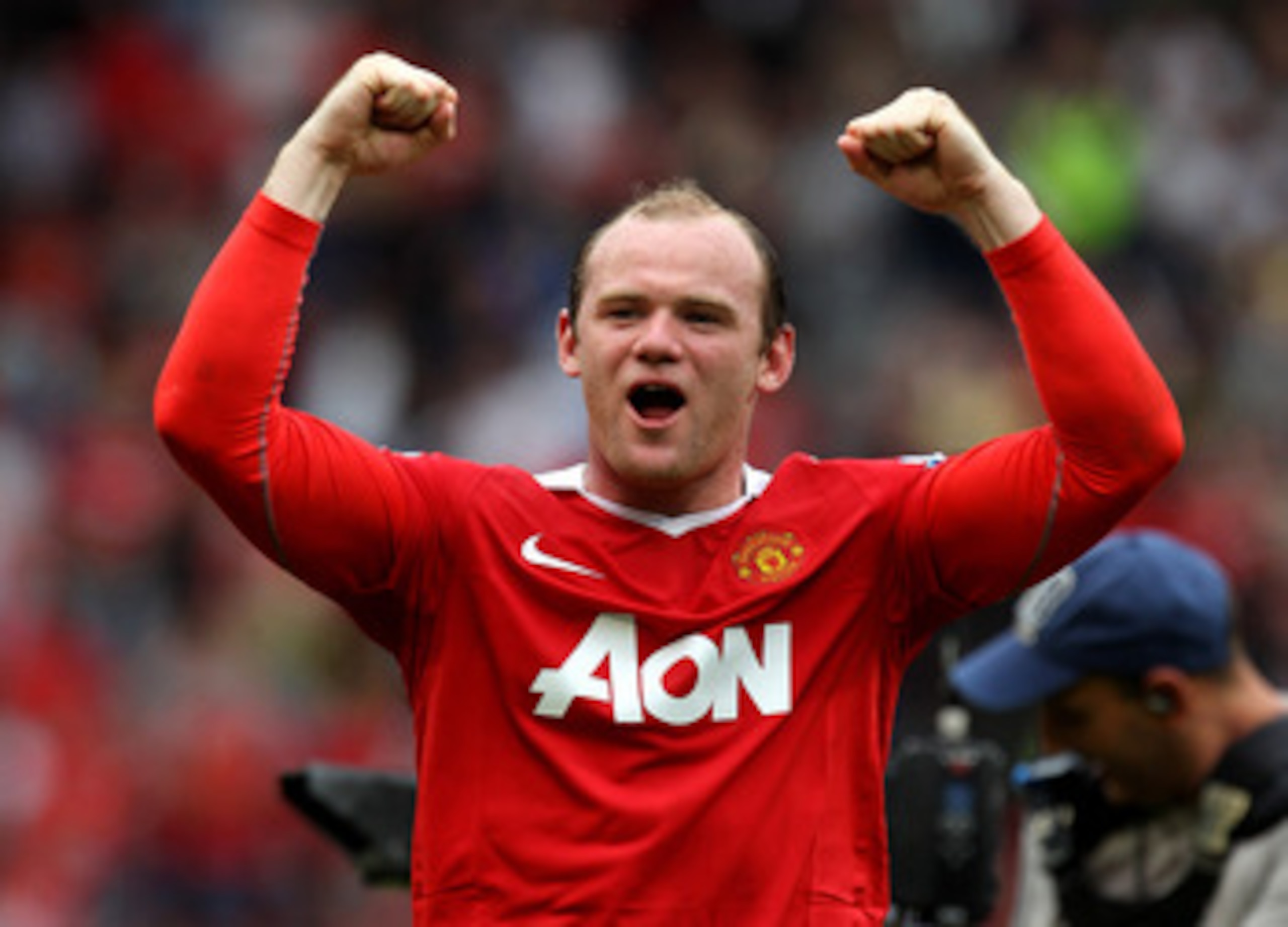 MANCHESTER, ENGLAND - MAY 08:  Wayne Rooney of Manchester United celebrates at the end of the Barclays Premier League match between Manchester United and Chelsea at Old Trafford on May 8, 2011 in Manchester, England.  (Photo by Alex Livesey/Getty Images)