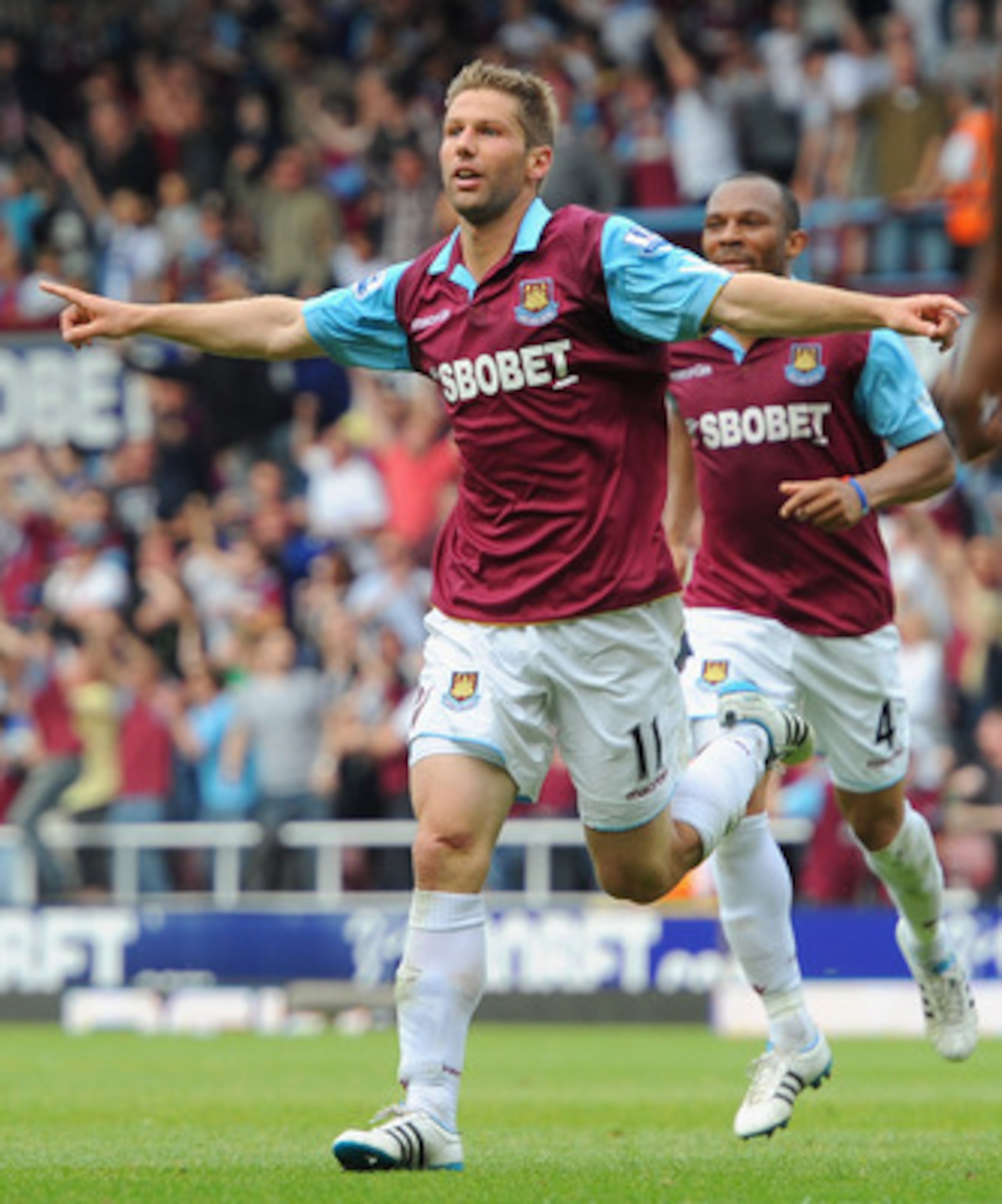 LONDON, ENGLAND - MAY 07:  Thomas Hitzlsperger of West Ham United celebrates scoring the equalising goal during the Barclays Premier League match between West Ham United and Blackburn Rovers at the Boleyn Ground on May 7, 2011 in London, England.  (Photo 