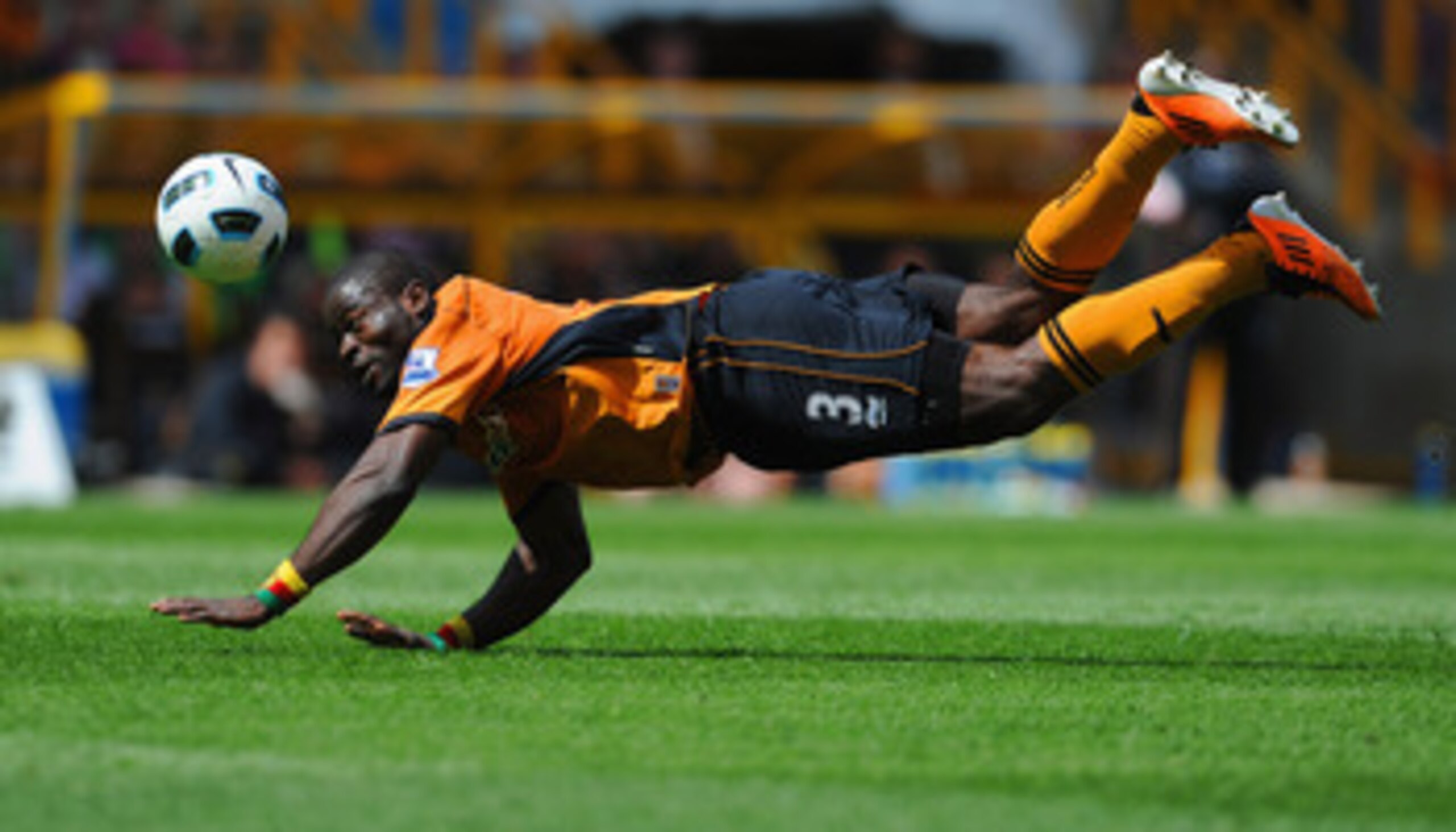 WOLVERHAMPTON, ENGLAND - MAY 08: George Elokobi of Wolves in action during the Barclays Premier League match between Wolverhampton Wanderers and West Bromwich Albion at Molineux on May 8, 2011 in Wolverhampton, England.  (Photo by Michael Regan/Getty Imag