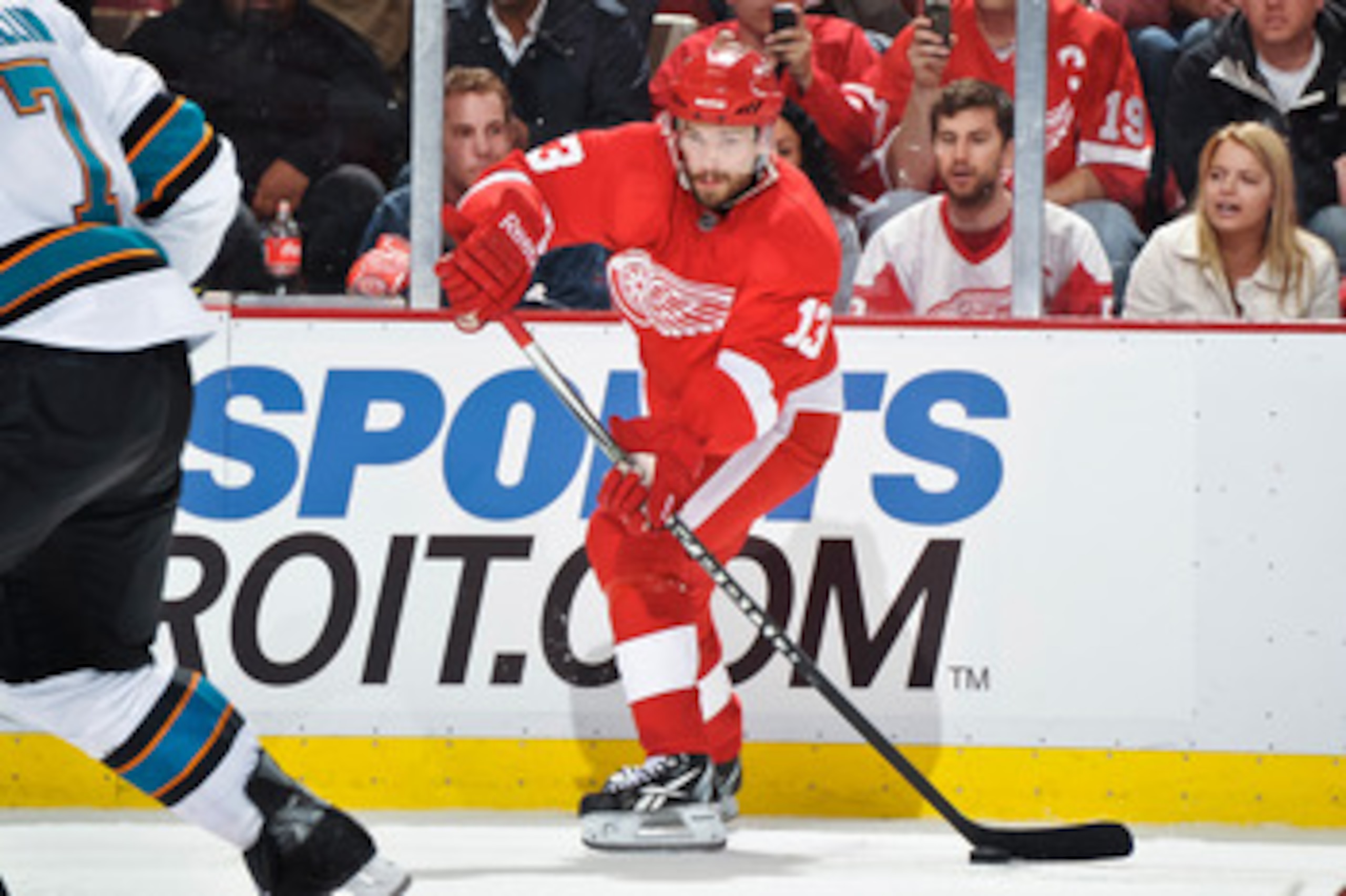 DETROIT - MAY 4: Pavel Datsyuk #13 of the Detroit Red Wings skates with the puck against the San Jose Sharks in Game Three of the Western Conference Semifinals during the 2011 NHL Stanley Cup Playoffs on May 4, 2011 at Joe Louis Arena in Detroit, Michigan