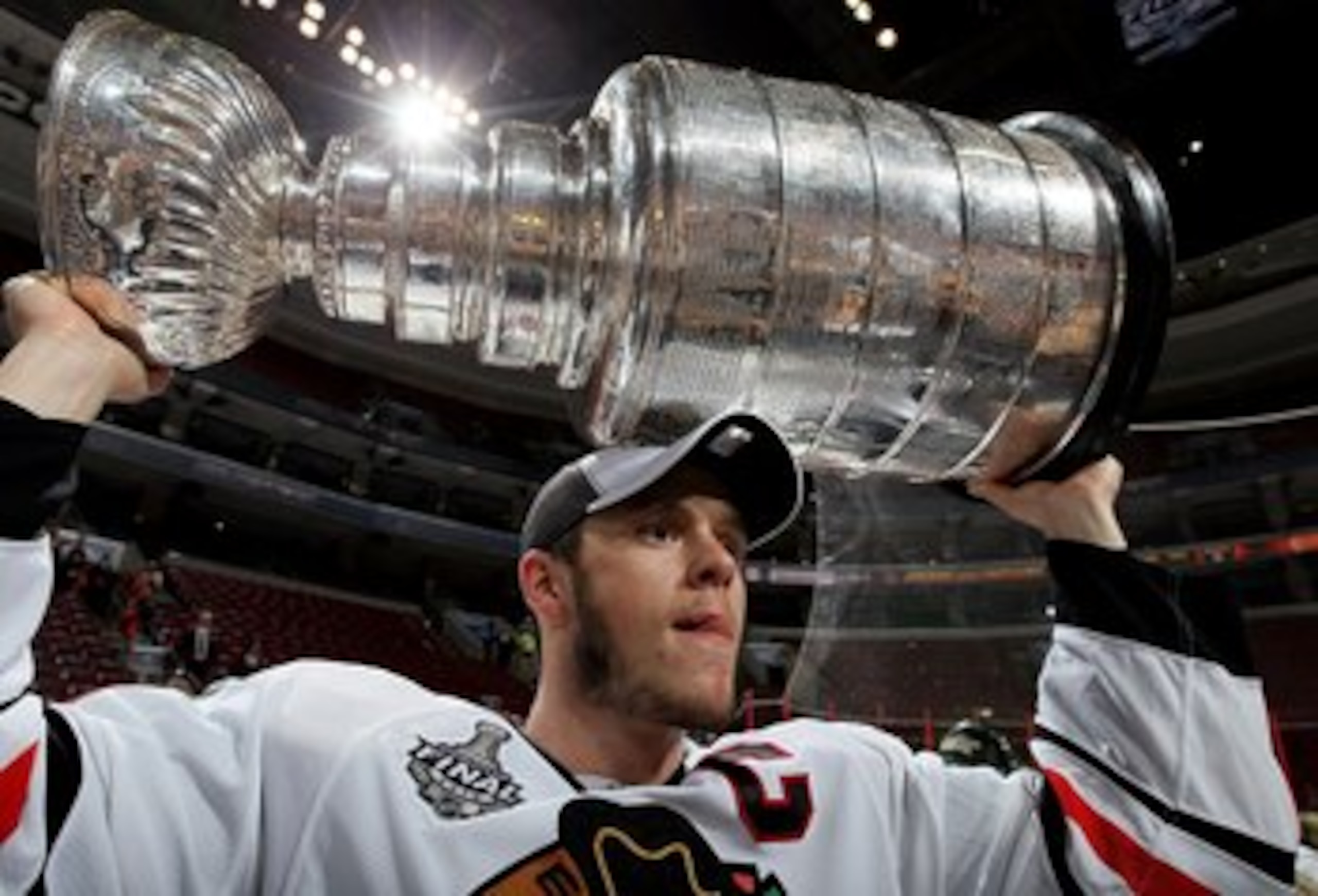 PHILADELPHIA - JUNE 09:  Jonathan Toews #19 of the Chicago Blackhawks hoists the Stanley Cup after teammate Patrick Kane scored the game-winning goal in overtime to defeat the Philadelphia Flyers 4-3 and win the Stanley Cup in Game Six of the 2010 NHL Sta