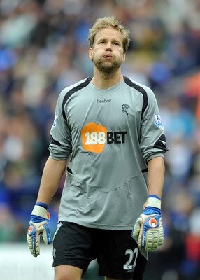 BOLTON, ENGLAND - MAY 07: Jussi Jaaskelainen of Bolton Wanderers reacts during the Barclays Premier League match between Bolton Wanderers and Sunderland at Reebok Stadium on May 7, 2011 in Bolton, England.  (Photo by Chris Brunskill/Getty Images)