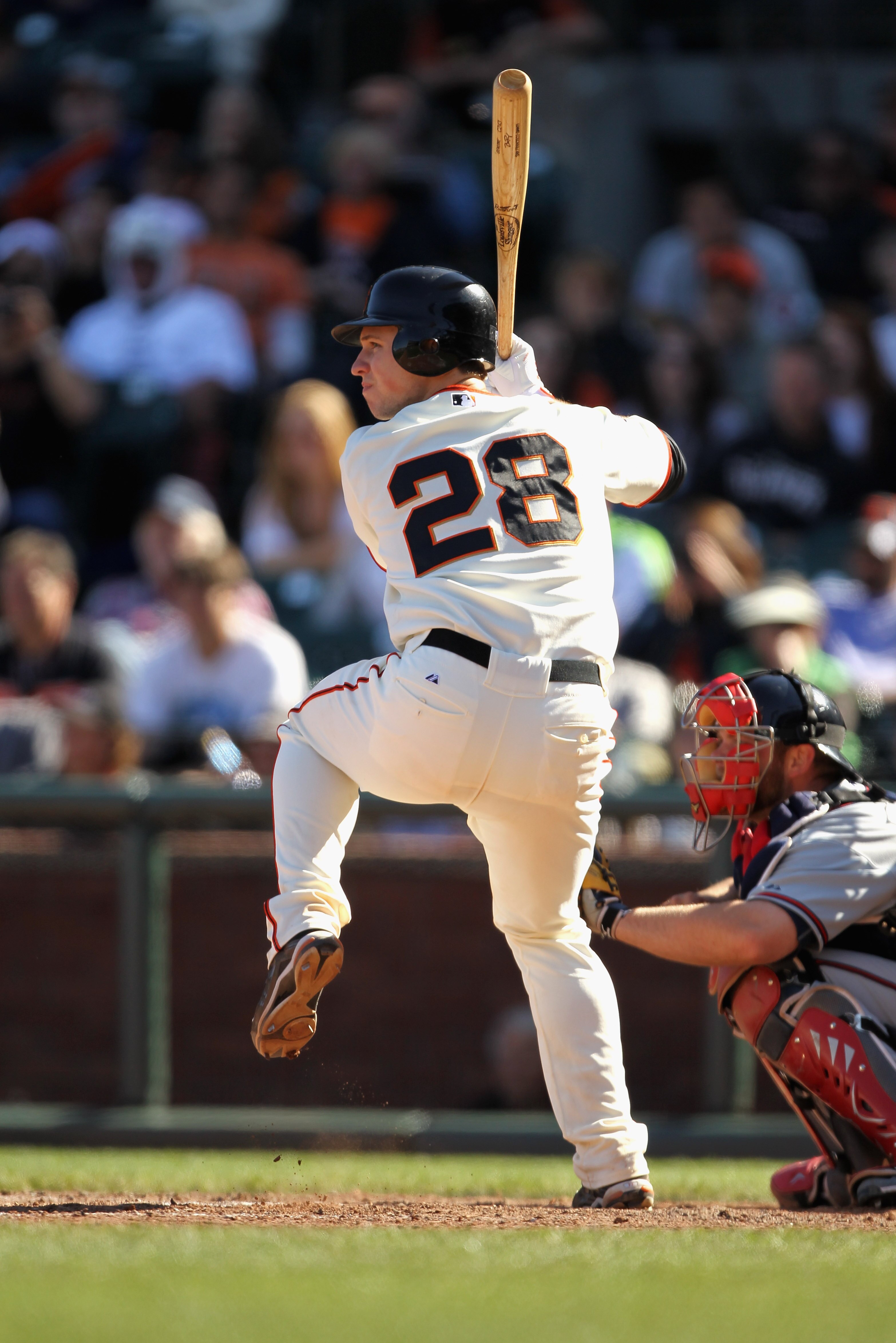 SAN FRANCISCO, CA - APRIL 24:  Buster Posey #28 of the San Francisco Giants in action against the Atlanta Braves at AT&T Park on April 24, 2011 in San Francisco, California.  (Photo by Ezra Shaw/Getty Images)