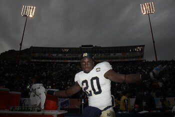 EL PASO, TX - DECEMBER 30:  Running back Cierre Wood #20 of the Notre Dame Fighting Irish celebrates a 33-17 win against the Miami Hurricanes at Sun Bowl on December 30, 2010 in El Paso, Texas.  (Photo by Ronald Martinez/Getty Images)