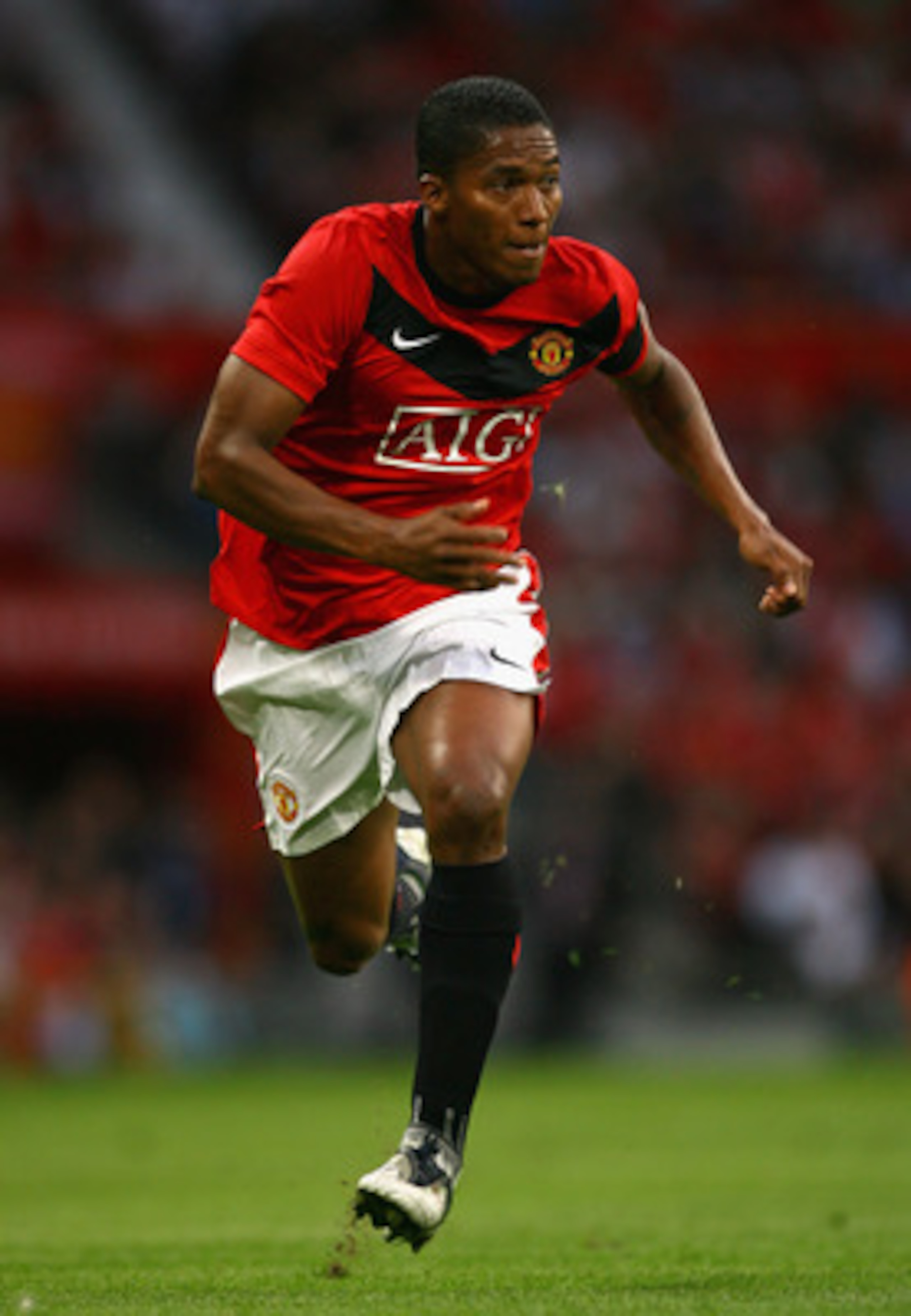 MANCHESTER, ENGLAND - AUGUST 05:  Antonio Valencia of Manchester United sprints during a pre season friendly match between Manchester United and Vallencia at Old Trafford on August 5, 2009 in Manchester, England.  (Photo by Alex Livesey/Getty Images)