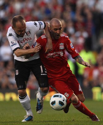 LONDON, ENGLAND - MAY 09:  Danny Murphy of Fulham fights for the ball with Raul Meireles of Liverpool during the Barclays Premier League match between Fulham and Liverpool at Craven Cottage on May 9, 2011 in London, England.  (Photo by Scott Heavey/Getty 