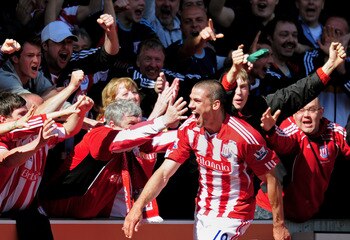 STOKE ON TRENT, ENGLAND - MAY 08:  Jonathan Walters of Stoke celebrates after scoring his team's third goal during the Barclays Premier League match between Stoke City and Arsenal at the Britannia Stadium on May 8, 2011 in Stoke on Trent, England.  (Photo