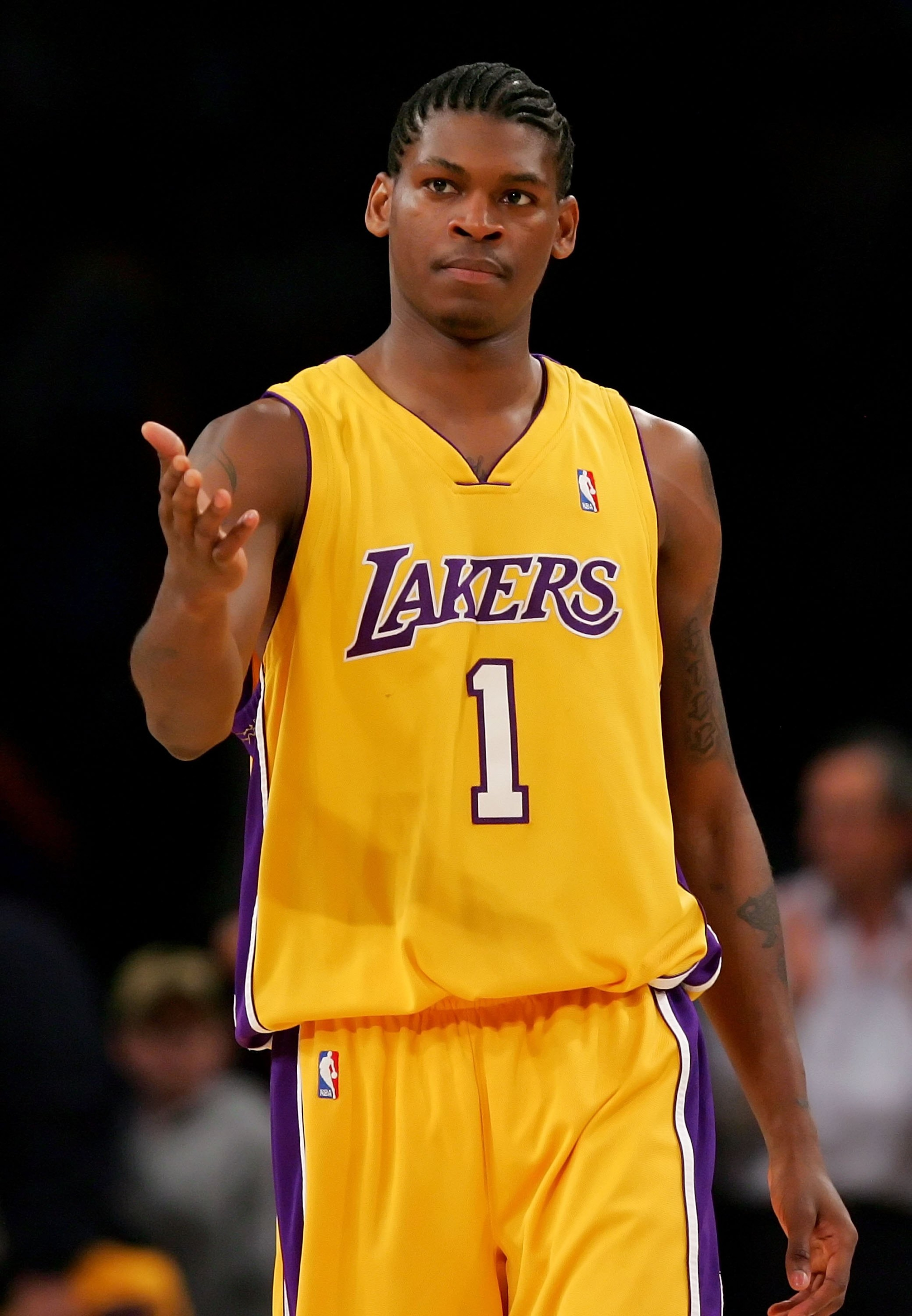 LOS ANGELES - APRIL 26: Smush Parker #1 of the Los Angeles Lakers celebrates a play in Game Three of the Western Conference Quarterfinals against the Phoenix Suns during the 2007 NBA Playoff at Staples Center on April 26, 2007 in Los Angeles, California. LOS ANGELES - APRIL 26: Smush Parker #1 of the Los Angeles Lakers celebrates a play in Game Three of the Western Conference Quarterfinals against the Phoenix Suns during the 2007 NBA Playoff at Staples Center on April 26, 2007 in Los Angeles, California.