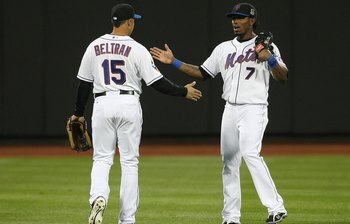FLUSHING, NY - APRIL 13:  Jose Reyes #7 of the New York Mets and teammate Carlos Beltran #15  in the field  against the San Diego Padres during opening day at Citi Field on April 13, 2009 in the Flushing neighborhood of the Queens borough of New York City