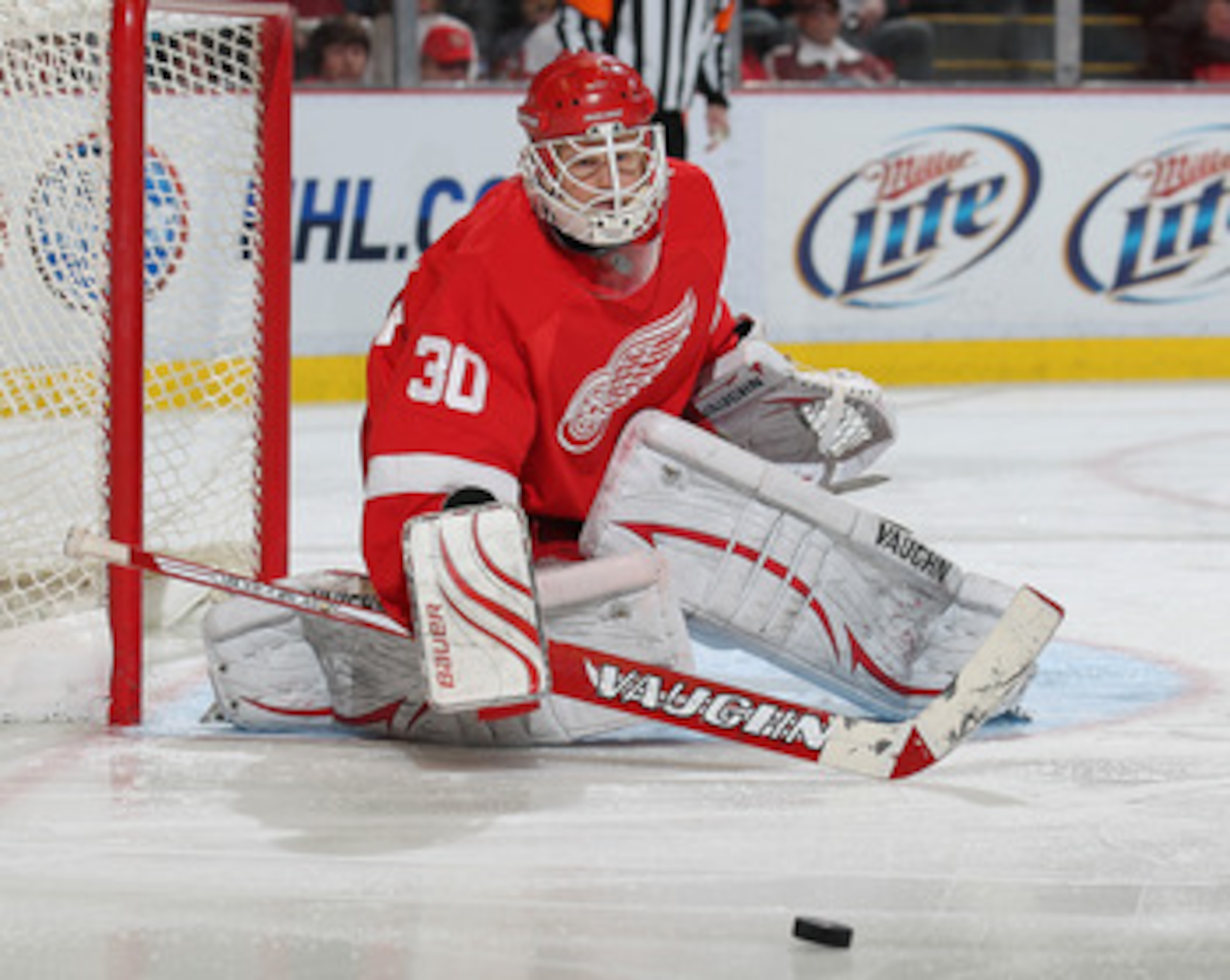 DETROIT, MI - JANUARY 2:  Chris Osgood #30 of the Detroit Red Wings turns a shot away in a game against the Philadelphia Flyers on January 2, 2011 at the Joe Louis Arena in Detroit, Michigan. The Flyers defeated the Wings 3-2. (Photo by Claus Anderzen/Get