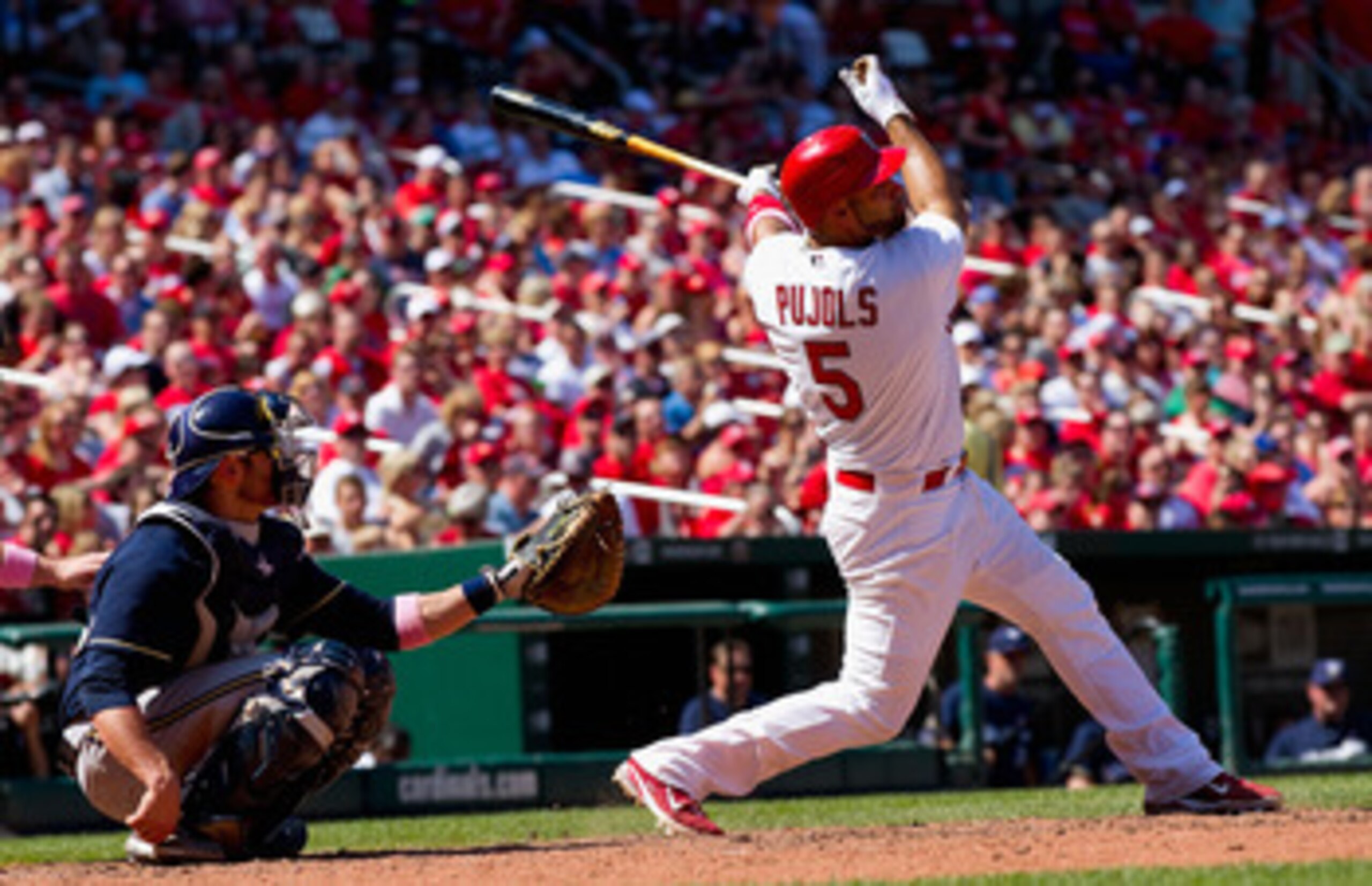ST. LOUIS, MO - MAY 8: Albert Pujols #5 of the St. Louis Cardinals hits a double against the Milwaukee Brewers at Busch Stadium on May 8, 2011 in St. Louis, Missouri.  (Photo by Dilip Vishwanat/Getty Images)