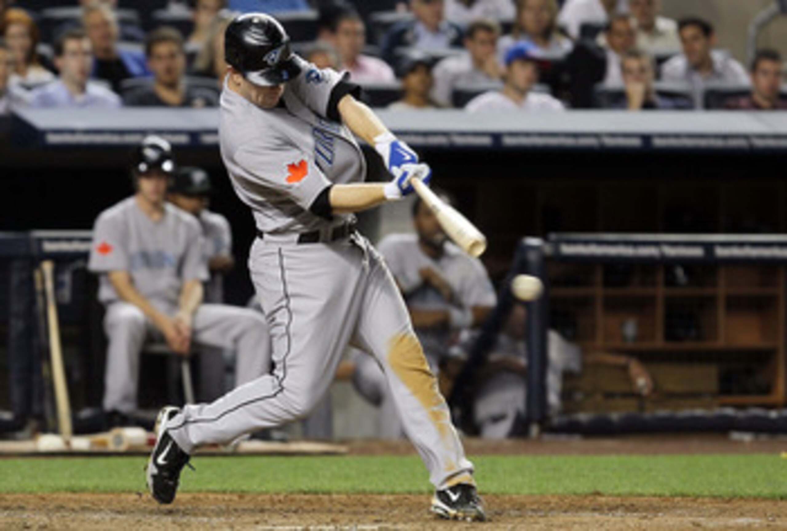 NEW YORK - AUGUST 02:  Aaron Hill #2 of the Toronto Blue Jays connects on a fifth inning RBI double against the New York Yankees on August 2, 2010 at Yankee Stadium in the Bronx borough of New York City.  (Photo by Jim McIsaac/Getty Images)