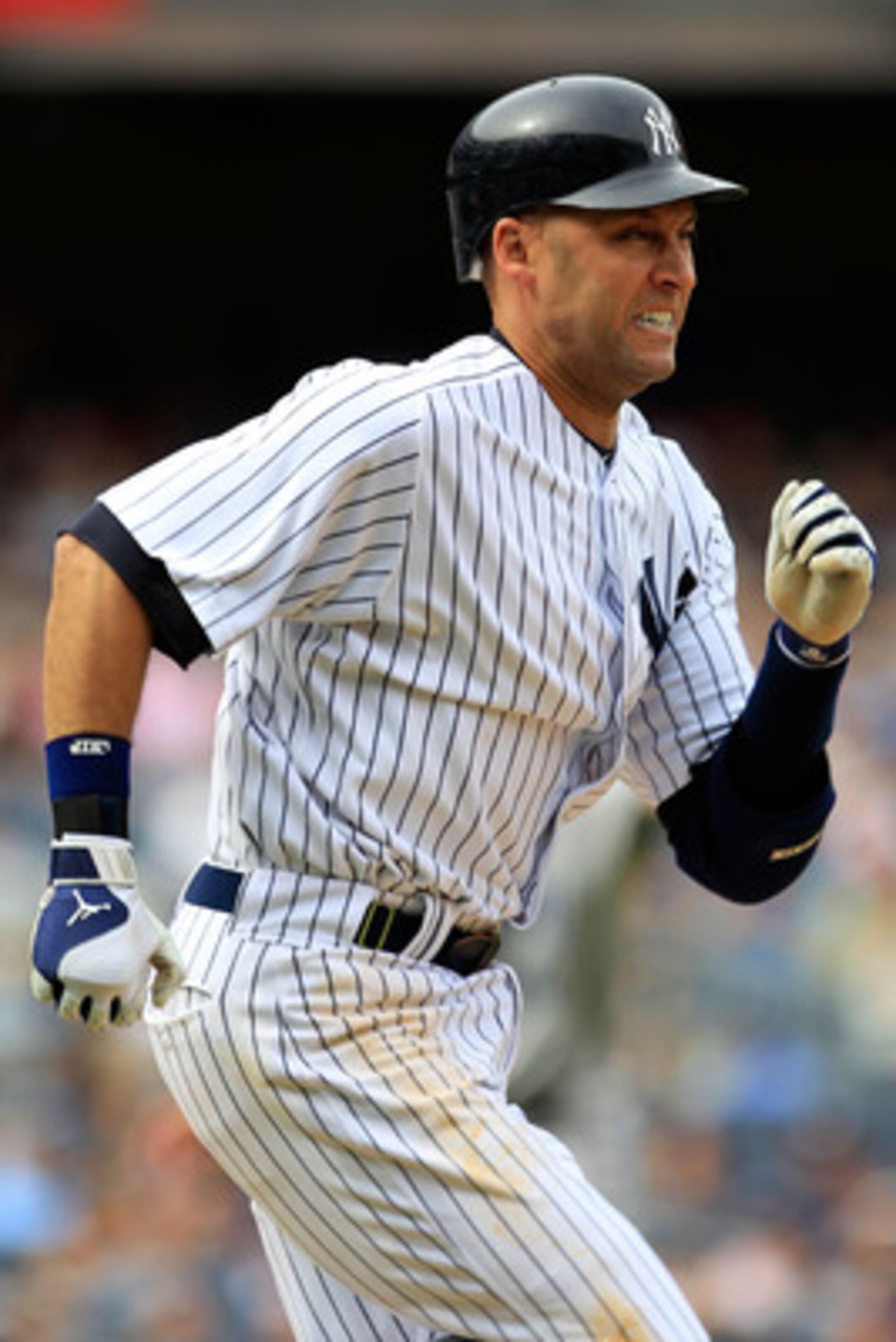 NEW YORK, NY - MAY 01: Derek Jeter #2 of the New York Yankees runs to first base against the Toronto Blue Jays at Yankee Stadium on May 1, 2011 in the Bronx borough of New York City. The Yankees defeated the  Blue Jays 5-2.  (Photo by Chris Trotman/Getty 