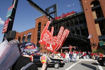 ST. LOUIS - APRIL 1:  A vendor sells foam fingers and pennants outside Busch Stadium before the St. Louis Cardinals game against the New York Mets during their Opening Day game on April 1, 2007 at Busch Stadium in St. Louis, Missouri.  The Mets beat the C