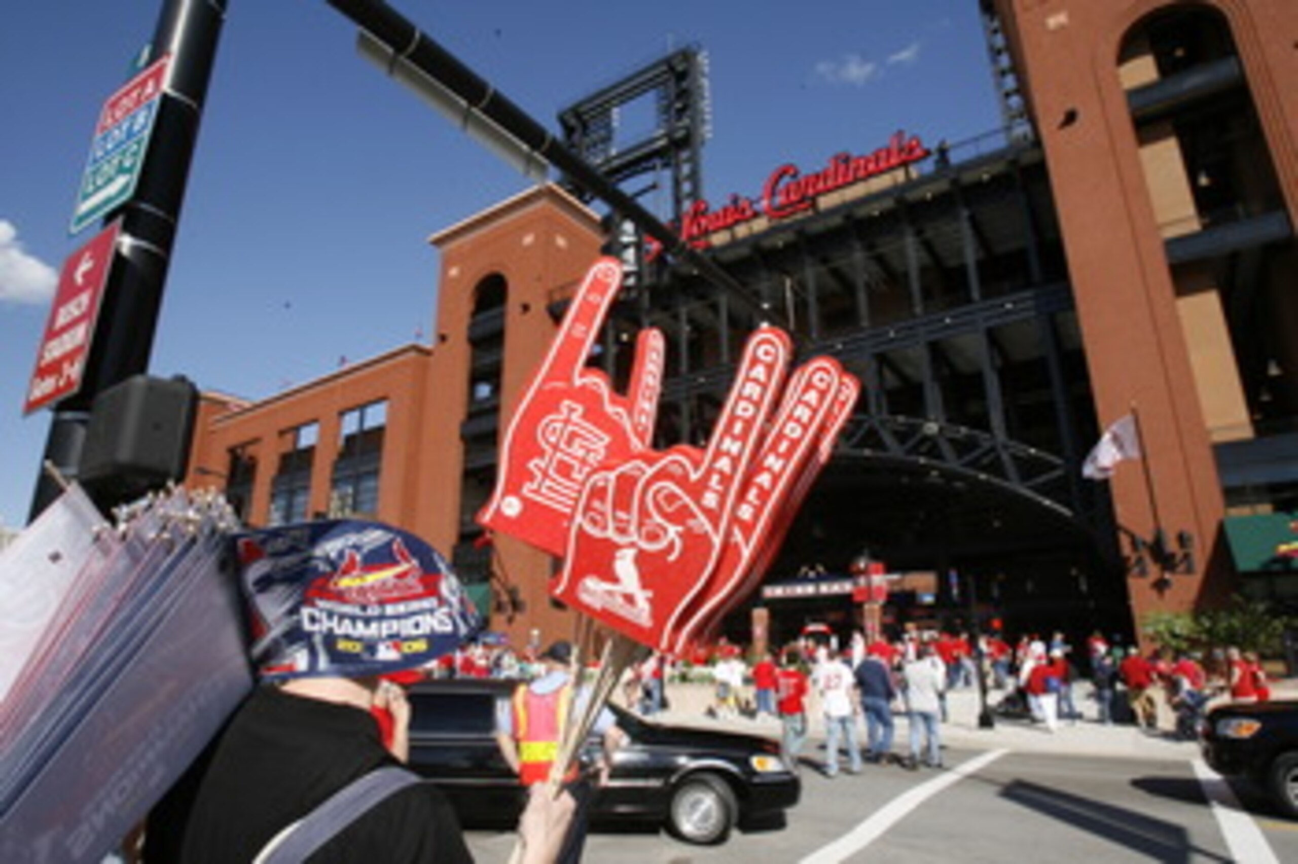 ST. LOUIS - APRIL 1:  A vendor sells foam fingers and pennants outside Busch Stadium before the St. Louis Cardinals game against the New York Mets during their Opening Day game on April 1, 2007 at Busch Stadium in St. Louis, Missouri.  The Mets beat the C