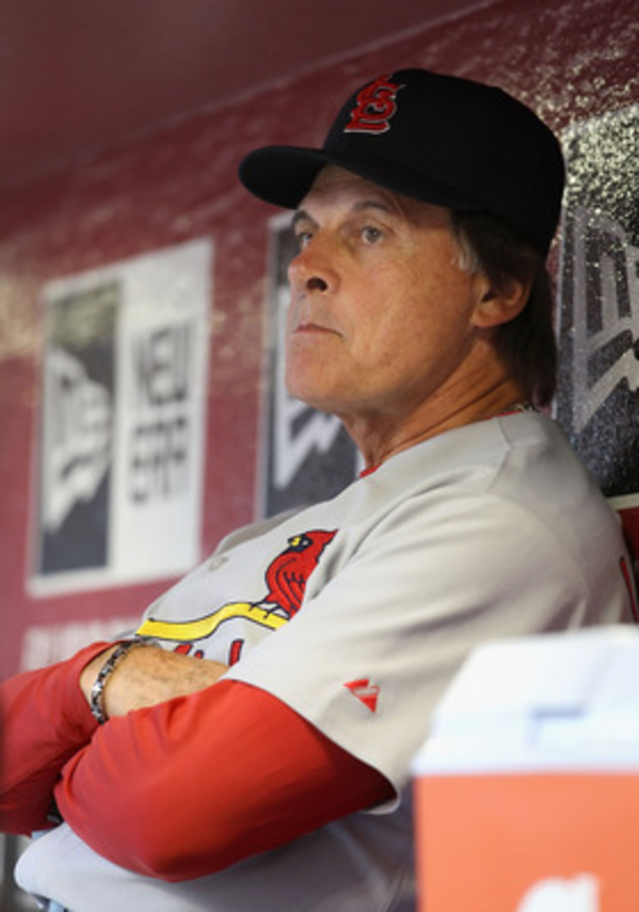 PHOENIX, AZ - APRIL 12:  Manager Tony La Russa of the St. Louis Cardinals sits in the dugout during the Major League Baseball game against the Arizona Diamondbacks at Chase Field on April 12, 2011 in Phoenix, Arizona.   The Diamondbacks defeated the Cardi