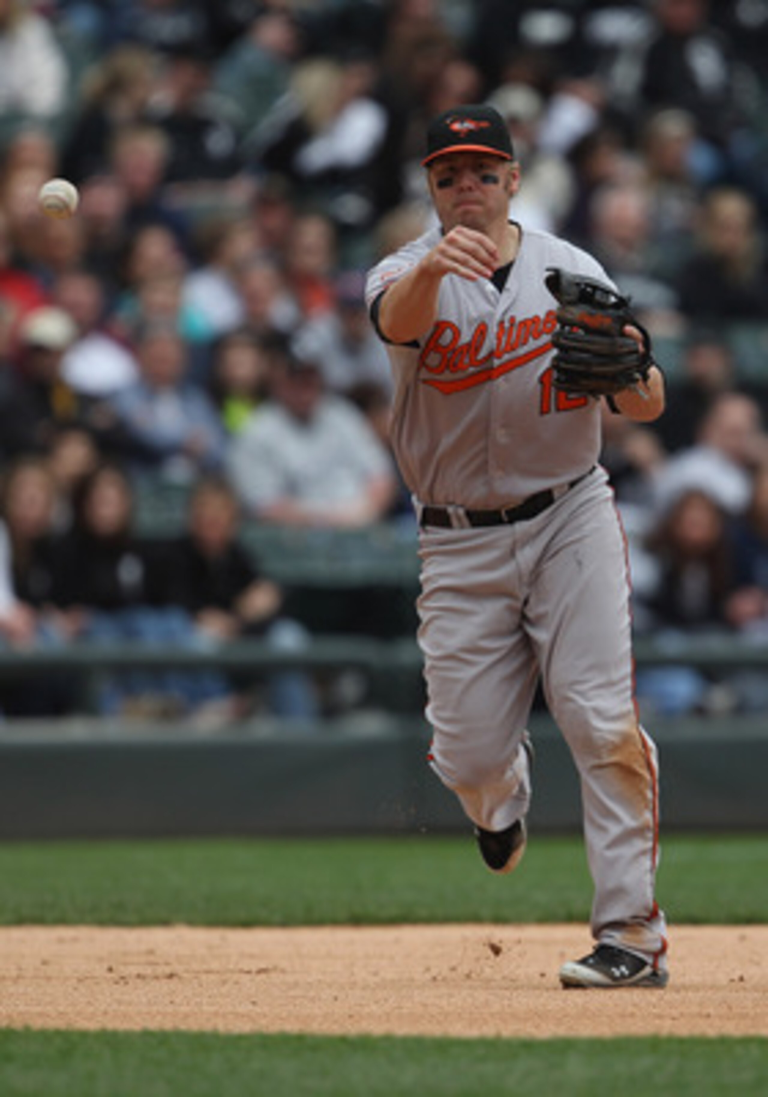CHICAGO, IL - MAY 01: Mark Reynolds #12 of the Baltimore Orioles throws out a Chicago White Sox runner at U.S. Cellular Field on May 1, 2011 in Chicago, Illinois. The Orioles defeated the White Sox 6-4. (Photo by Jonathan Daniel/Getty Images)