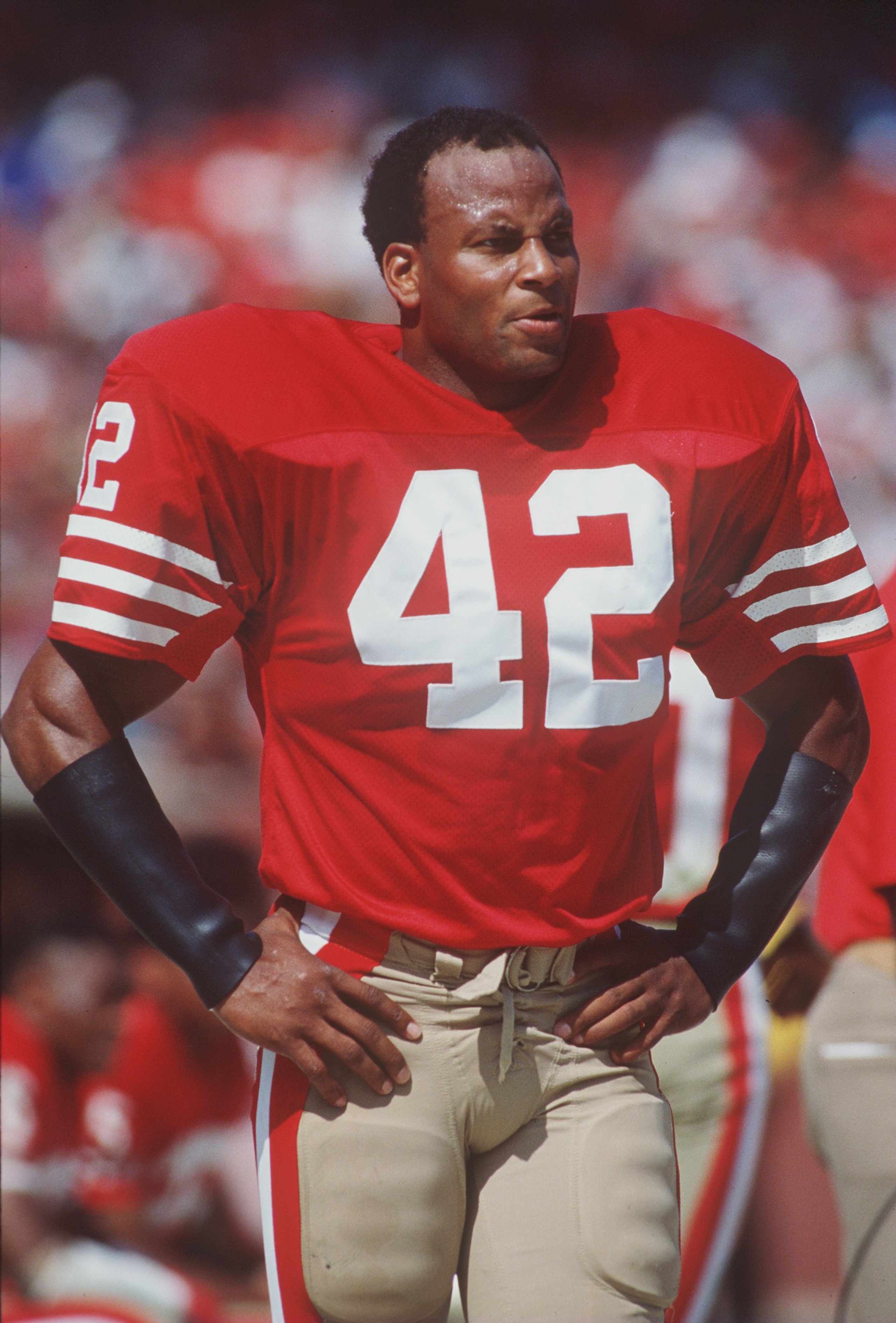 23 Sep 1990:  Strong safety Ronnie Lott of the San Francisco 49ers stands and relaxes on the sideline while the offense is on the field during the 49ers 19-13 victory over the Atlanta Falcons at Candlestick Park in San Francisco, California.   MandatoryCr