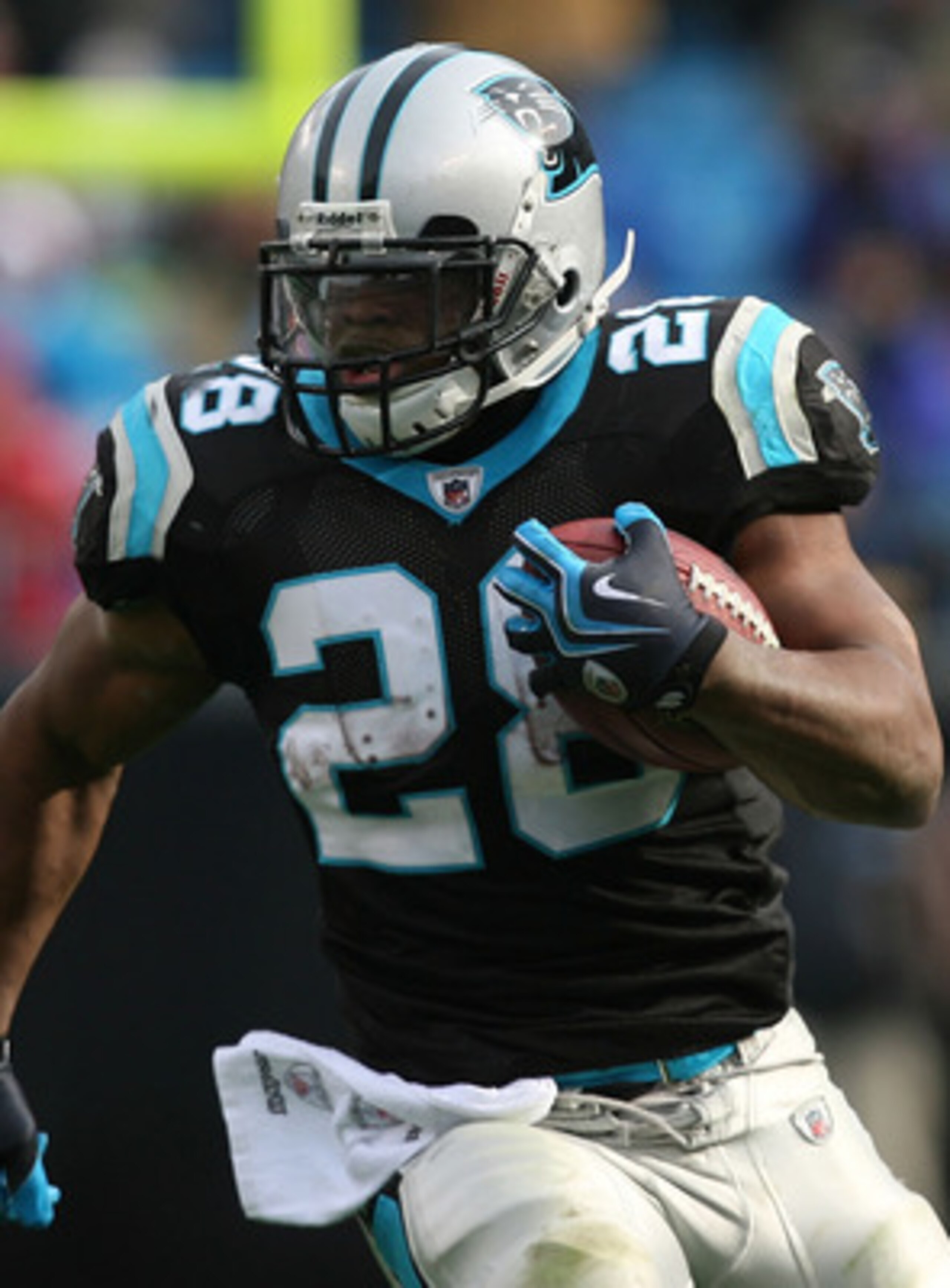 CHARLOTTE, NC - DECEMBER 06:  Jonathan Stewart #28 of the Carolina Panthers runs with the ball against the Tampa Bay Buccaneers during their game at Bank of America Stadium on December 6, 2009 in Charlotte, North Carolina.  (Photo by Streeter Lecka/Getty
