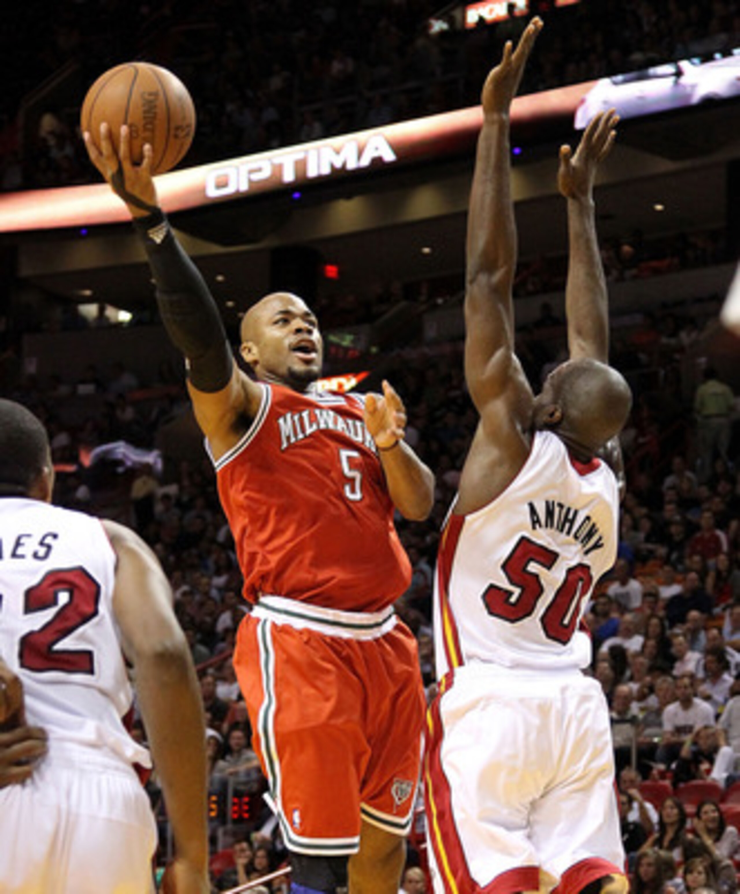MIAMI, FL - APRIL 06:  Corey Maggette #5 of the Milwaukee Bucks shoots over Joel Anthony #50 of the Miami Heat during a game at American Airlines Arena on April 6, 2011 in Miami, Florida. NOTE TO USER: User expressly acknowledges and agrees that, by downl