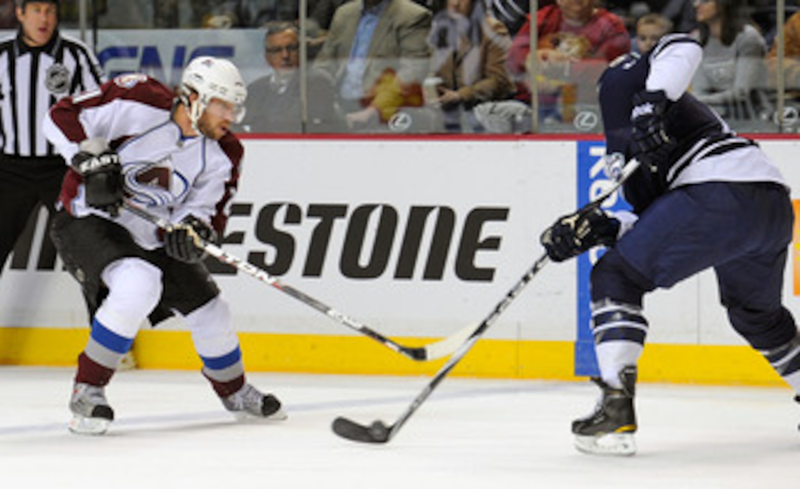 NASHVILLE, TN - FEBRUARY 12:  Peter Forsberg #21 of the Colorado Avalanche skates against Shea Weber #6 of the Nashville Predators on February 12, 2011 at the Bridgestone Arena in Nashville, Tennessee.  (Photo by Frederick Breedon/Getty Images)