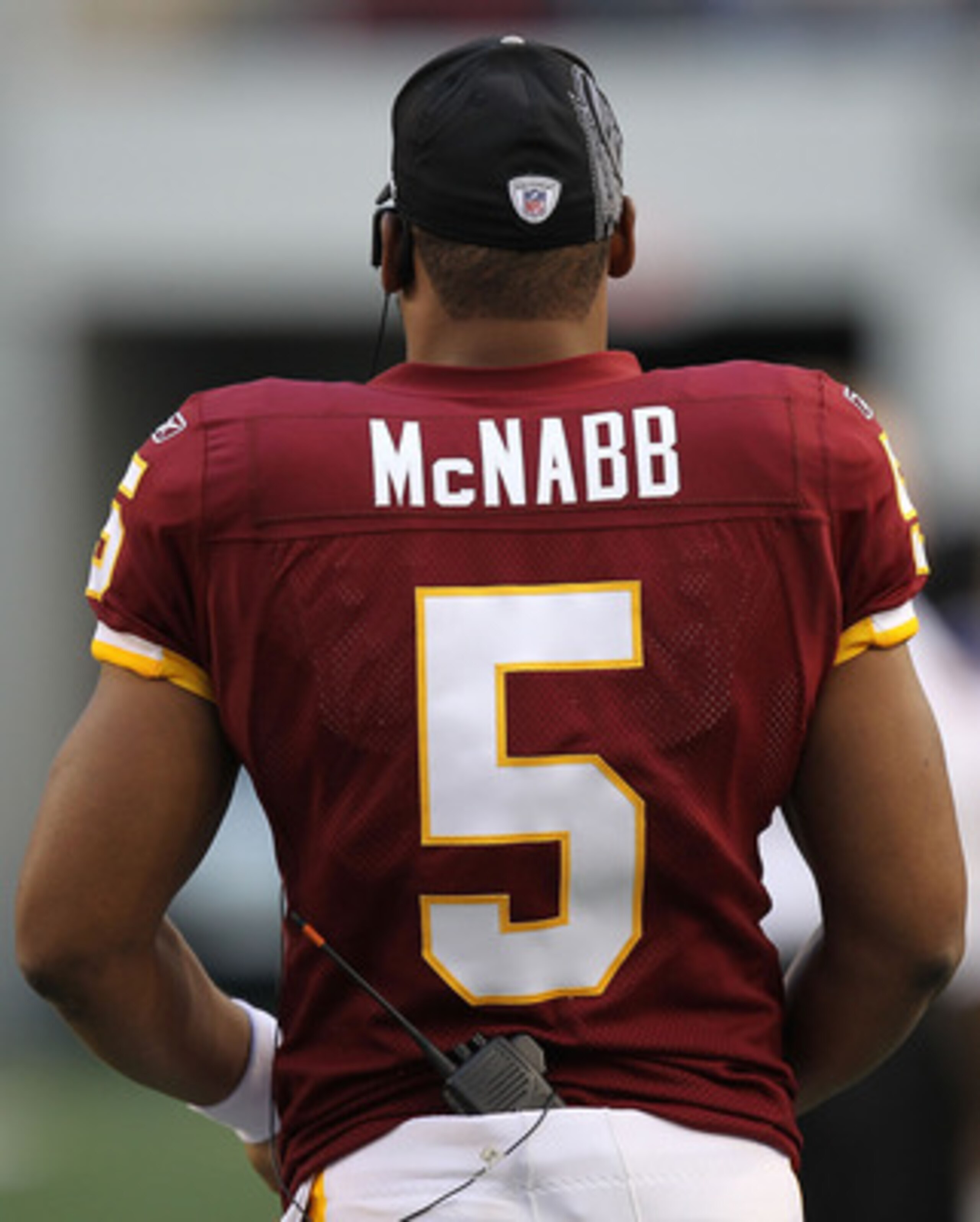 ARLINGTON, TX - DECEMBER 19:  Quarterback Donovan McNabb #5  of the Washington Redskins on the sidelines against play against the Dallas Cowboys at Cowboys Stadium on December 19, 2010 in Arlington, Texas.  (Photo by Ronald Martinez/Getty Images)