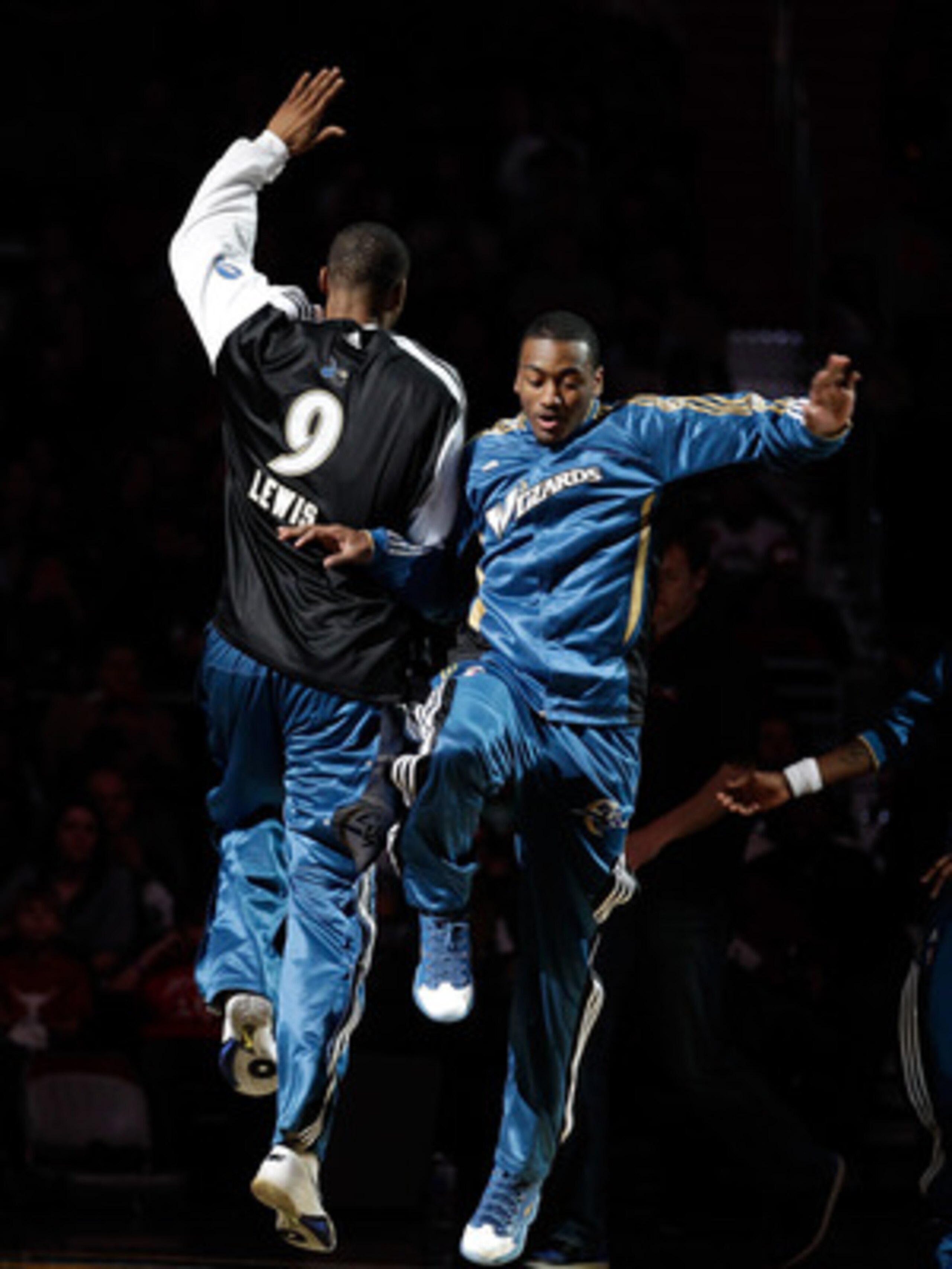 WASHINGTON, DC - FEBRUARY 26: Rashard Lewis #9  and John Wall #2 (R) of the Washington Wizards are introduced before the start of an NBA game against the Dallas Mavericks at the Verizon Center on February 26, 2011 in Washington, DC. NOTE TO USER: User exp